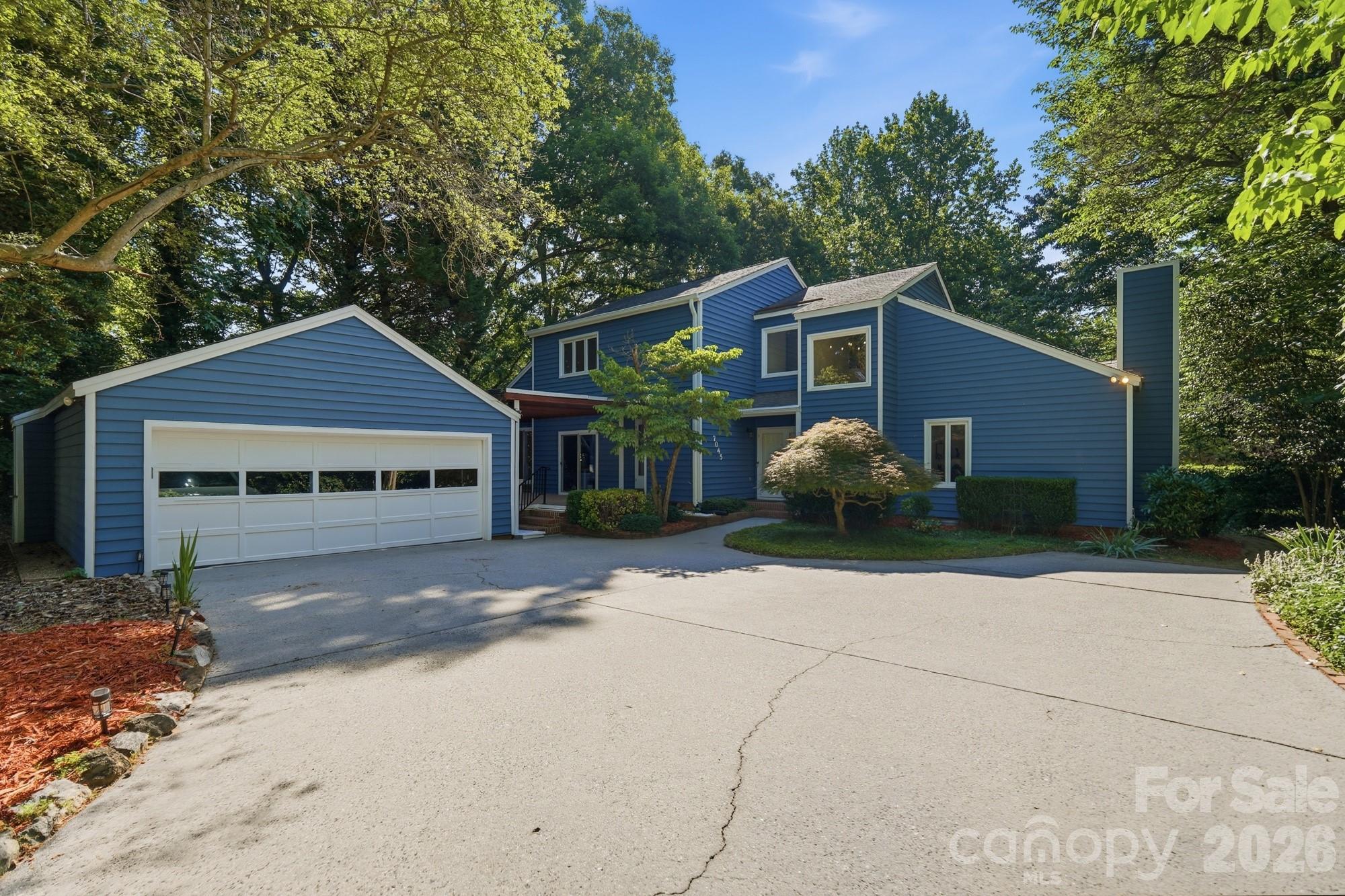 Welcome to the highly desirable Medearis community! This fantastic property sits on a beautiful half-acre lot surrounded by mature landscaping and features both front and backyard decks, perfect for relaxing or entertaining. The detached garage offers excellent flexibility for parking, storage, or workshop space.

Inside, you’ll find a versatile floor plan with the option of a primary suite on either the first or second floor. The spacious living room features a cozy fireplace, Pergo flooring, and French doors leading out to the deck. A separate dining room flows into the kitchen, complete with all appliances and a charming oversized window box ideal for growing fresh herbs.

Just outside the main-level bedroom is a sunken den that works perfectly as a sitting room, office, or flex space. The bright sunroom overlooks the private backyard and provides a peaceful place to unwind year-round. Sellers have also installed solar panels, adding valuable energy efficiency to the home.

Located in a beautiful established neighborhood known for mature trees and large lots, this home offers convenient access to Ballantyne, SouthPark, Uptown Charlotte, shopping, dining, and more! Brand NEW HVAC unit was also just installed!