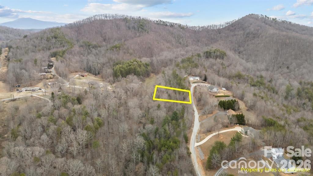 Beautiful 1.51-acre lot in the desirable Glenwood area, ready for your dream home! Enjoy this gently sloping, wooded lot in a peaceful & private setting. The community features beautiful homes with wooded buffers for added privacy. Deeded restrictions require a 1,600 sq. ft. minimum build—site-built homes only (no mobile or modular). No HOA dues, just a $180/yr road maintenance fee. A well and septic are needed; underground utilities are available.
Located near I-40 & US-221, offering quick access to Marion, Asheville, Morganton, and Hickory. Don’t miss this prime opportunity!