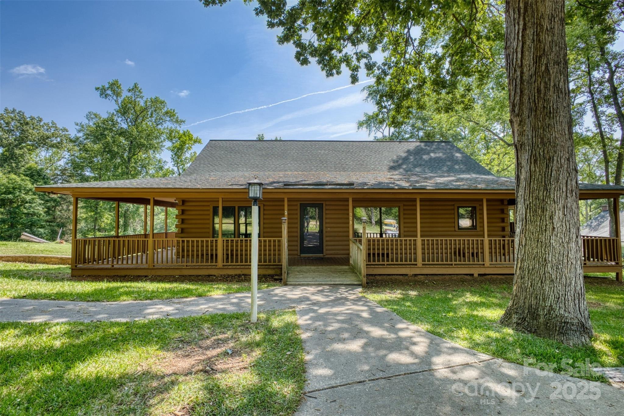 For the first time ever, this riverside retreat on the Catawba River is ready for its new owner! Built in 1990, this +/- 35 year old cute cabin on the Catawba is ready to begin its new chapter! With 2 bedrooms, 3 full bathrooms, +/- 2,350 sqft., & upstairs bonus room this cabin has a rustic, yet comfortable charm and beauty; the perfect blend of a man-made creation surrounded by the beauty that only mother nature can provide. Inside, the living space has ample wood trim & wainscoting, hardwood floors, stained woodwork throughout and scenic views of the river. The inviting kitchen is ready for your morning coffee or your evening gatherings. The basement (with 2-car garage & vault room) offers you more space for hobbies, recreation, your workshop, or simply for storage. Outside, enjoy wonderful waterfront living—ideal for kayaking, fishing, or simply relaxing on the dock as the water rolls by.  Don’t miss your chance to own this true relaxing, riverside retreat! Schedule a showing today!