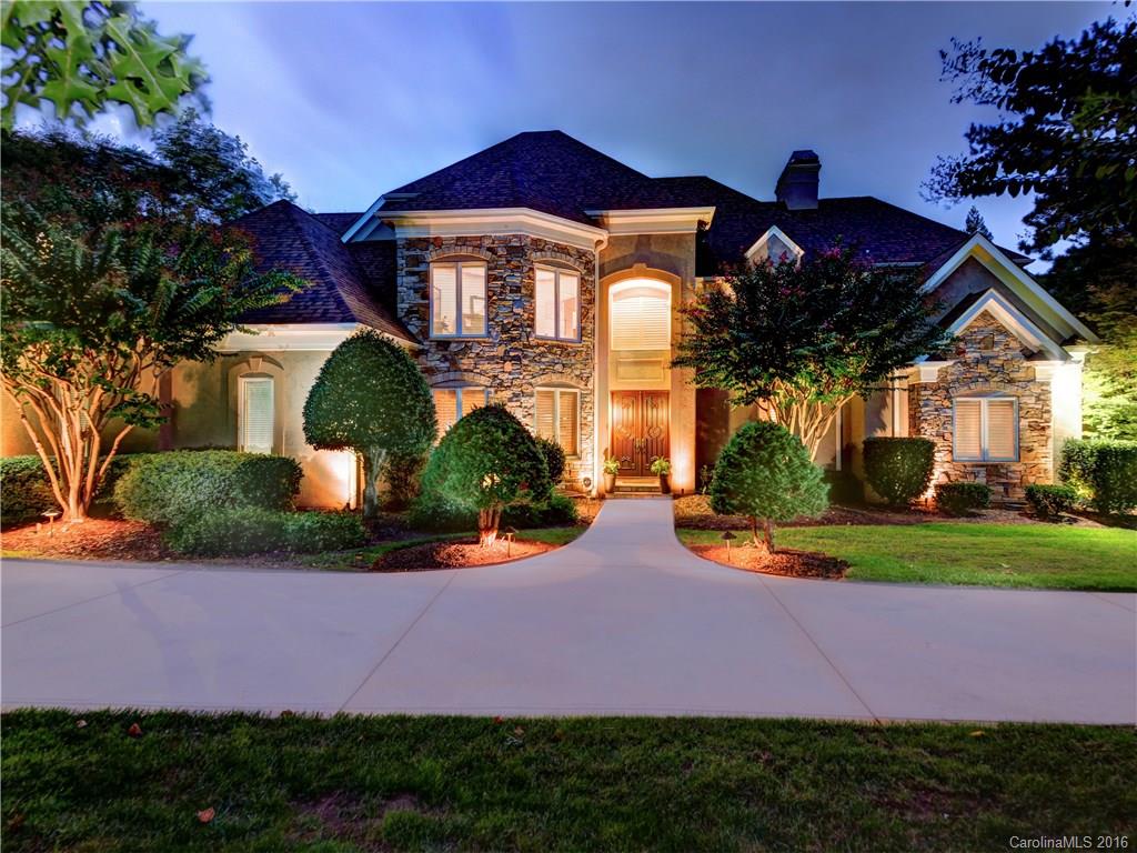 A grand feeling comes over you the moment you step foot in this beautiful custom Simonini home! Majestic entrance opens to the best in open floorplan living. Coffered ceilings, custom molding, no luxury detail is spared! Kitchen has custom cabinetry, center island is large enough to dine. Master on the main w/ spa-like bath & large walk-in closet. 4 bedrooms, 3.2 baths. Tons of storage, including attic. Covered terraces up & down. Back yard is a breathtaking oasis, with pool & spa. Must see!