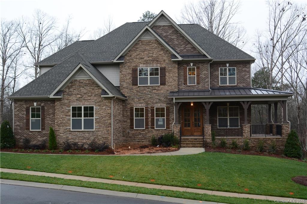 Stunning all brick home in prestigious Tega Cay! Dual Master with chefs gourmet kitchen with high end appliances, 5" hardwoods first floor, 3 car side load garage, ceramic tile in all baths, 3 piece crown mouldings and private lot. This home is a must see with so much to offer minutes from shopping, restaurants, I-77 and only 25 minutes from uptown Charlotte.