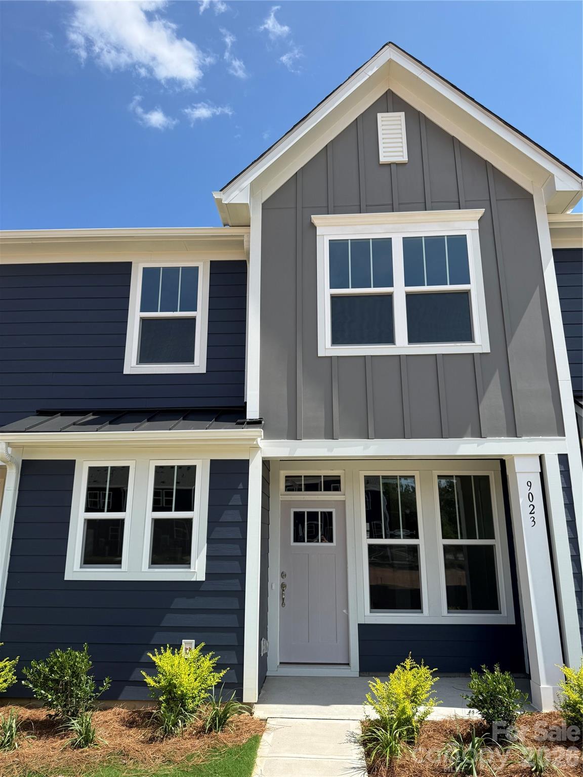 Welcome to Odell Park Premier Townhomes Offering the Most Convenient Access to Regional Commuter Routes and Concord Mills. Our Rochester plan features 3BR / 2.5BA  with a 1-car garage offering modern design and practical spaces just minutes to I-485 , Highland Creek, and Concord Mills Blvd. The main level features an open-concept layout with luxury vinyl plank flooring. The kitchen includes quartz countertops, stainless steel appliances, a spacious island, and an approximately 12' deep finished storage closet—ideal for pantry or utility use. A bright dining area and connected family room make the space inviting for both daily living and entertaining. Upstairs, the Rochester plan offers three bedrooms, two full baths, and a convenient laundry closet. The primary bedroom and bathroom highlight a 5' tiled shower, dual vanities, and a large walk-in closet. Secondary bedrooms provide flexibility for work-from-home, guests, or hobbies. Odell Park offers quick access to  shopping, dining, parks, major highways, UNC Charlotte, and local employment centers. HOA services cover water, trash removal, lawn care, and landscaping, supporting a low-maintenance lifestyle in a convenient Charlotte location. This home is ready for a Quick Move - In.