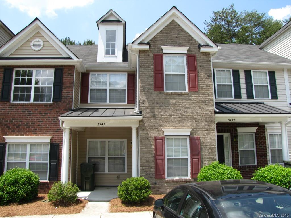 This affordable town home is close to shopping, dining and schools. The foyer opens to the family room with a fireplace, which flows into the kitchen and dining area for easy entertaining. Sliding doors access the back yard with wooded views for added privacy. Two master suites with walk-in closets and private baths are located upstairs, along with the laundry. Note: Interior photos shown are of the same floor plan, but a different unit.