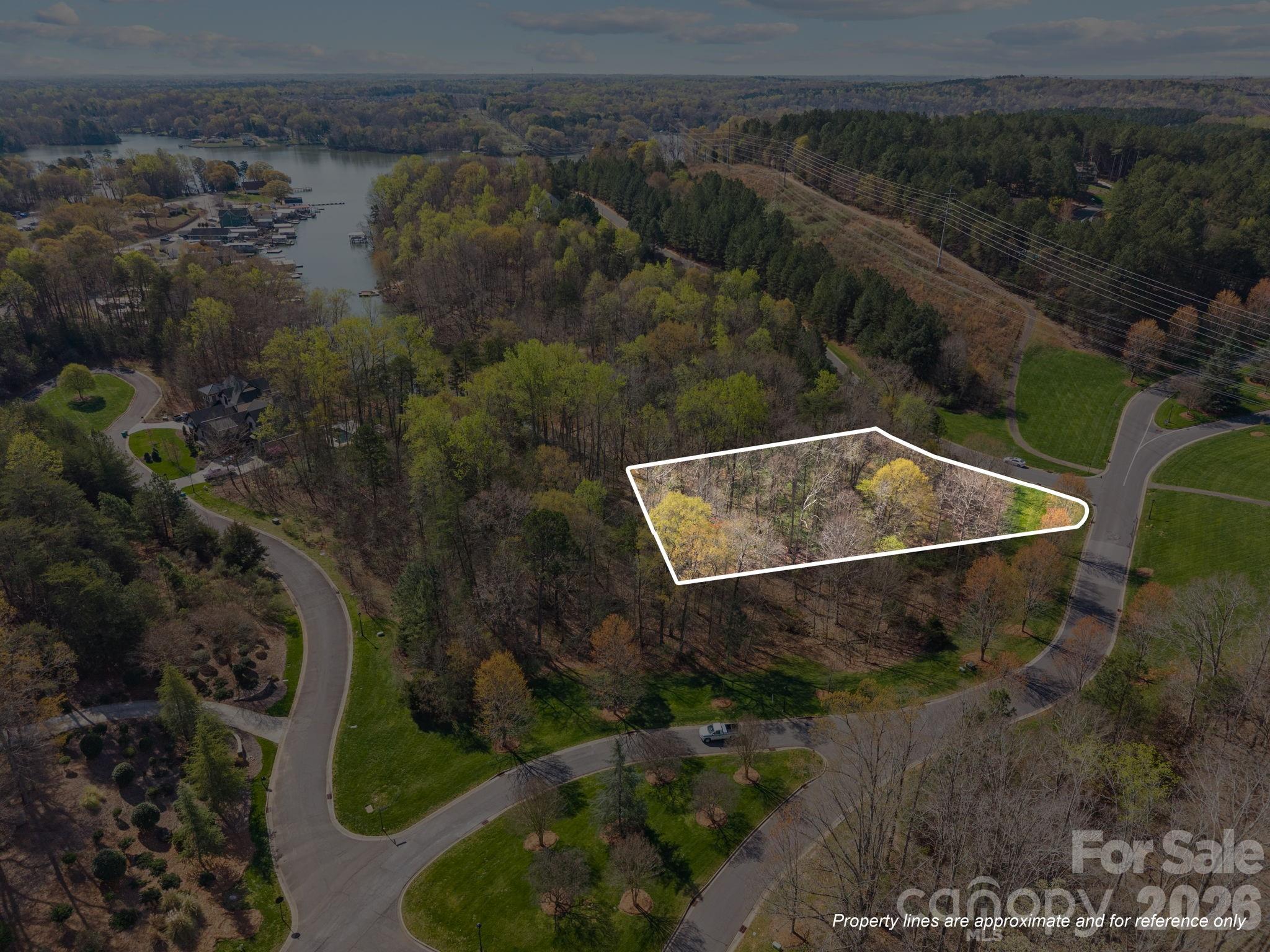 Build your dream home on this exceptional waterfront lot in the highly sought-after Reflection Pointe community. Nestled along the shores with serene water views, this property offers the perfect blend of privacy, natural beauty, and upscale living. Enjoy direct water access, kayaking, or simply relaxing by the shoreline.

Reflection Pointe is a premier gated community known for its resort-style amenities, including a clubhouse, pool, tennis courts, walking trails, and marina. With gently sloping terrain and ample space to design your custom home, this lot provides endless possibilities to create your own private retreat.