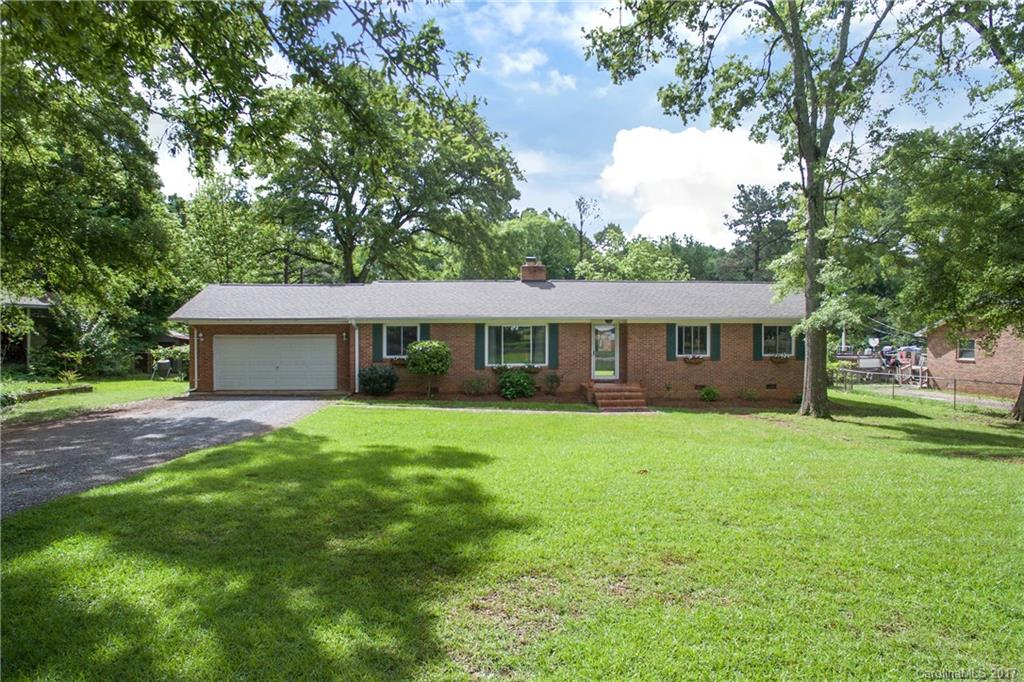 This remodeled brick ranch WILL NOT LAST LONG! It has 3 bedrooms, 2 bathrooms, an open floor plan, granite countertops, hardwood floors, a large screened in porch and deck, and a private backyard.  Located very close to I-77, local stores and restaurants. Come see this beautiful home!