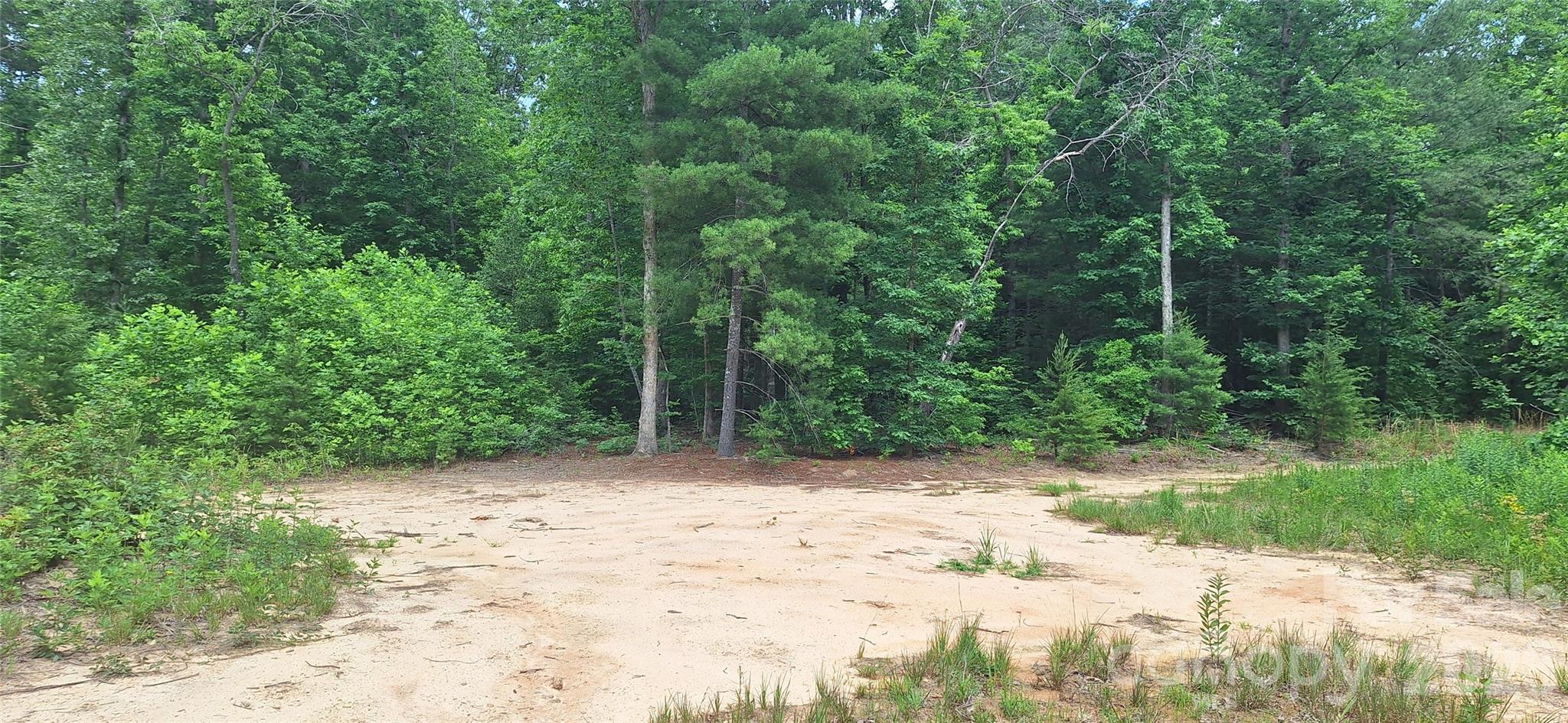 60 acres with the least restrictive zoning in the county! Nice area away from the road already cleared for a home. 178 feet of road frontage. Serene mountain backdrop. Already has some hiking or 4-wheeler trails. The meandering creek across the back portion of the property allows for watering of livestock or dig out one of the little pooled up areas for your very own swimming hole! Image looking at the mountain view while curled up on the porch with your favorite beverage. Wildlife galore! In close proximity to South Mountain State Park. Central location between lakes for water sports. You can go hiking at Table Rock or walk across the mile-high swinging bridge at Grandfather Mountain, all within a short drive. Nearby access to the 469 miles of Blue Ridge Parkway which has 40+ overlook areas for views of breathtaking autumn colors! Easy access to I-40 which runs from NC all the way to California! The tourist areas of the mountains are within a short drive and offer all kinds of seasonal activities including water tubing, skiing and snow tubing with quaint shops for a memorable dining and shopping experience. Opportunities like this are rare in this area, making it a perfect canvas for both personal enjoyment and future investment. Don't let this opportunity pass you by! Owning such a property doesn't get any better than this. Sellers related to Listing Agent.