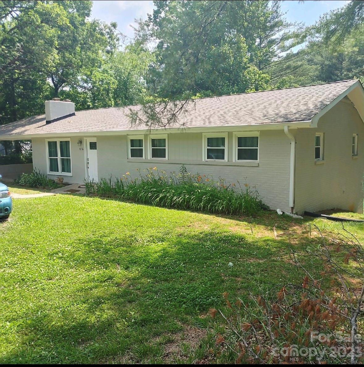 Terrific ranch home on just over an acre of land with fully finished downstairs apartment features full kitchen, dining area, living room, bedroom, laundry, and full bath. Apartment has a separate exterior door yet can also be accessed, if desired, from inside with lockable door to interior stairwell. Main level boasts open kitchen with dining area and deck access, living room with fireplace, primary suite with full bath, bedroom, and bonus room. This home boasts a new roof with Leaf Filter gutter guard, new kitchen cabinets with granite countertops, refinished wood floors, and tile in kitchen/dining area and bathrooms. This beautiful property is great for anyone needing a separate living space for vacation rental, long term tenant, guest accommodations, or in-law quarters, or utilize the entire house yourself. Extra storage space in the unfinished basement. Basement wall to be reinforced by foundation contractor. Upstairs HVAC to be repaired.