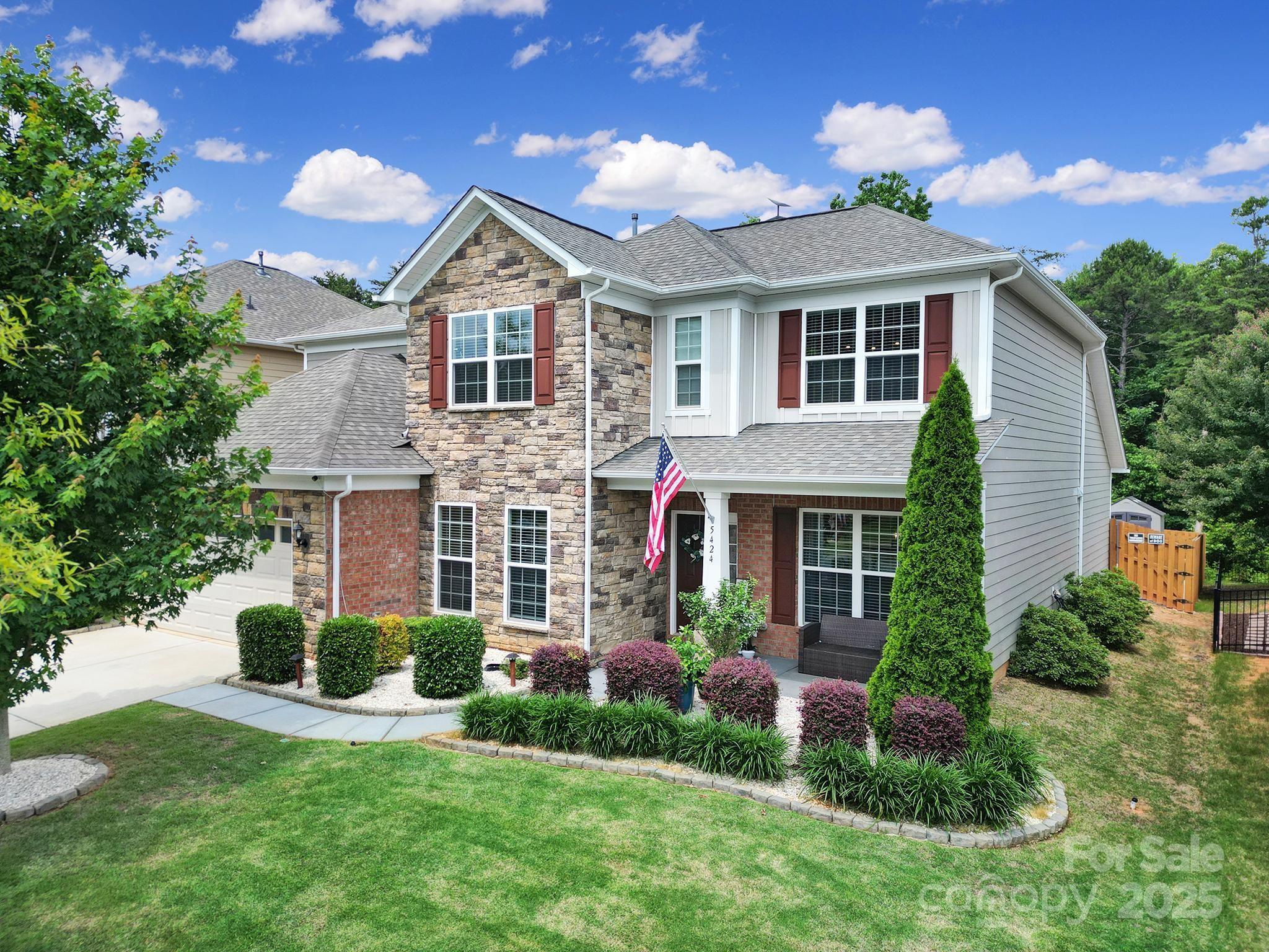 This meticulously maintained home in highly desired Matthews offers a spacious & thoughtfully designed living space. The foyer opens up to a formal dining room w/wainscoting, an office/flex space, & hallway w/half bath & laundry room. The living room & chef's kitchen are open-concept w/ built-in surround sound, fireplace, oversized island & 2nd dining area. Notice a unique pocket office overlooking all of it. The primary bedroom w/ ensuite & large walk-in closet is tucked away on the main floor overlooking the beautiful backyard. Upstairs, you’ll find a large loft, 3 additional bedrooms, & full bathroom. There's no lack of storage w/ walk-in attic space & an abundance of closet space throughout. Out back is a gardener's & entertainer's private paradise w/ 2 patios, 7x7 storage shed, planter boxes, trellises & more! Work & play from home w/ no problem using Google Fiber. The 3-car garage has plenty of room for your tools & toys & is prewired for EV car charger.