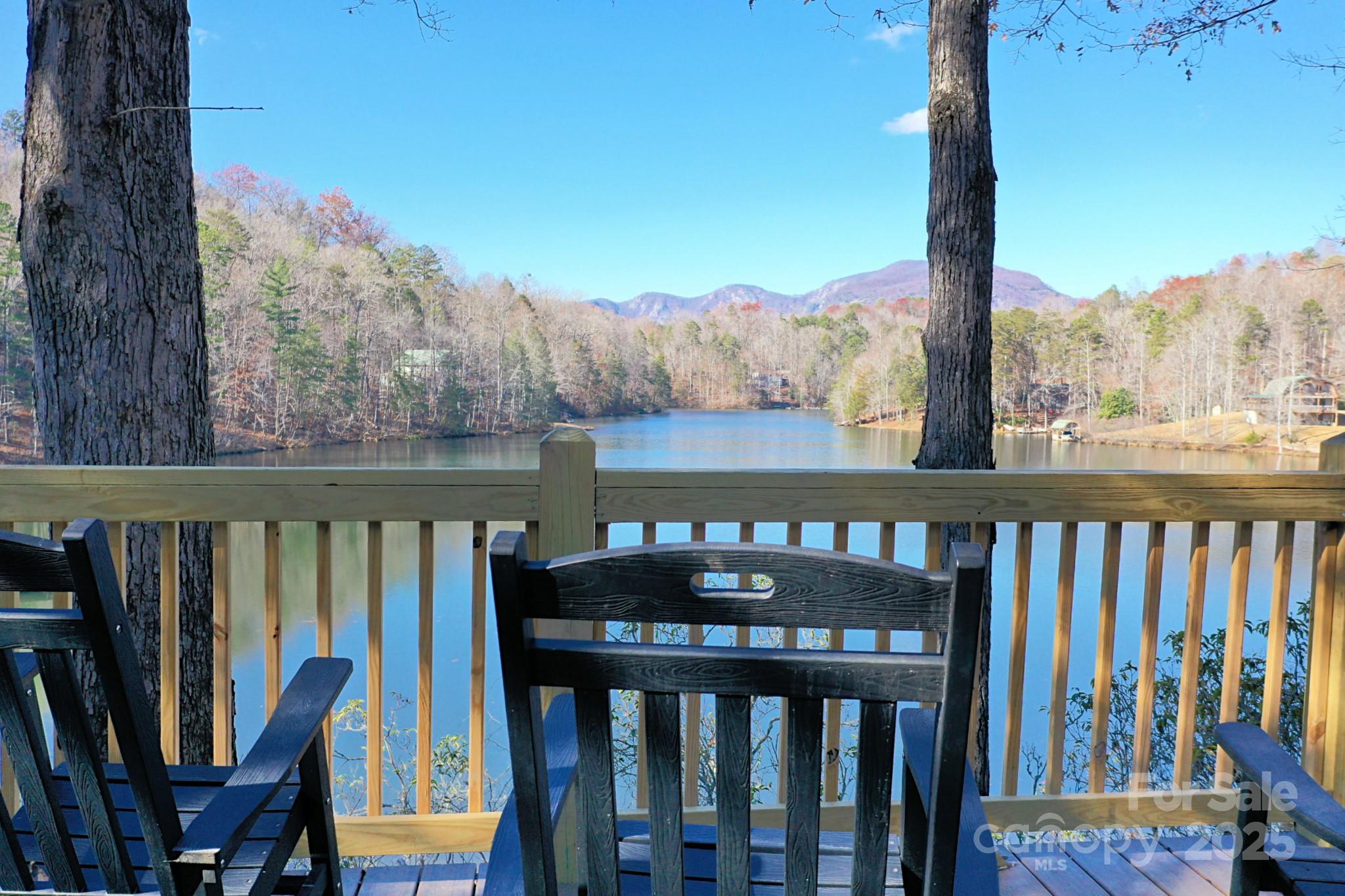 Discover the beauty of Riverbend at Lake Lure, a community nestled near the tranquil shores of Lake Lure. This secure, gated development is a haven for outdoor enthusiasts, offering a wide range of recreational activities. Enjoy two serene lakes—one complete with a sandy beach and picnic pavilion, scenic walking trails adorned with waterfalls, and an inviting swimming hole in the river.
This exceptional lot has been thoughtfully combined from two into one, granting you the flexibility to realize your vision for your home. With a gentle slope leading to a spacious, flat building area, it’s perfectly designed for your construction ambitions. The vibrant businesses in the Town of Lake Lure are ready to welcome you, and you’ll be just a short drive from the charming towns of Rutherfordton, Asheville, and Greenville. Seize the opportunity to create your unique sanctuary in this breathtaking location! To learn more, go to Riverbendlakelurepoa.com