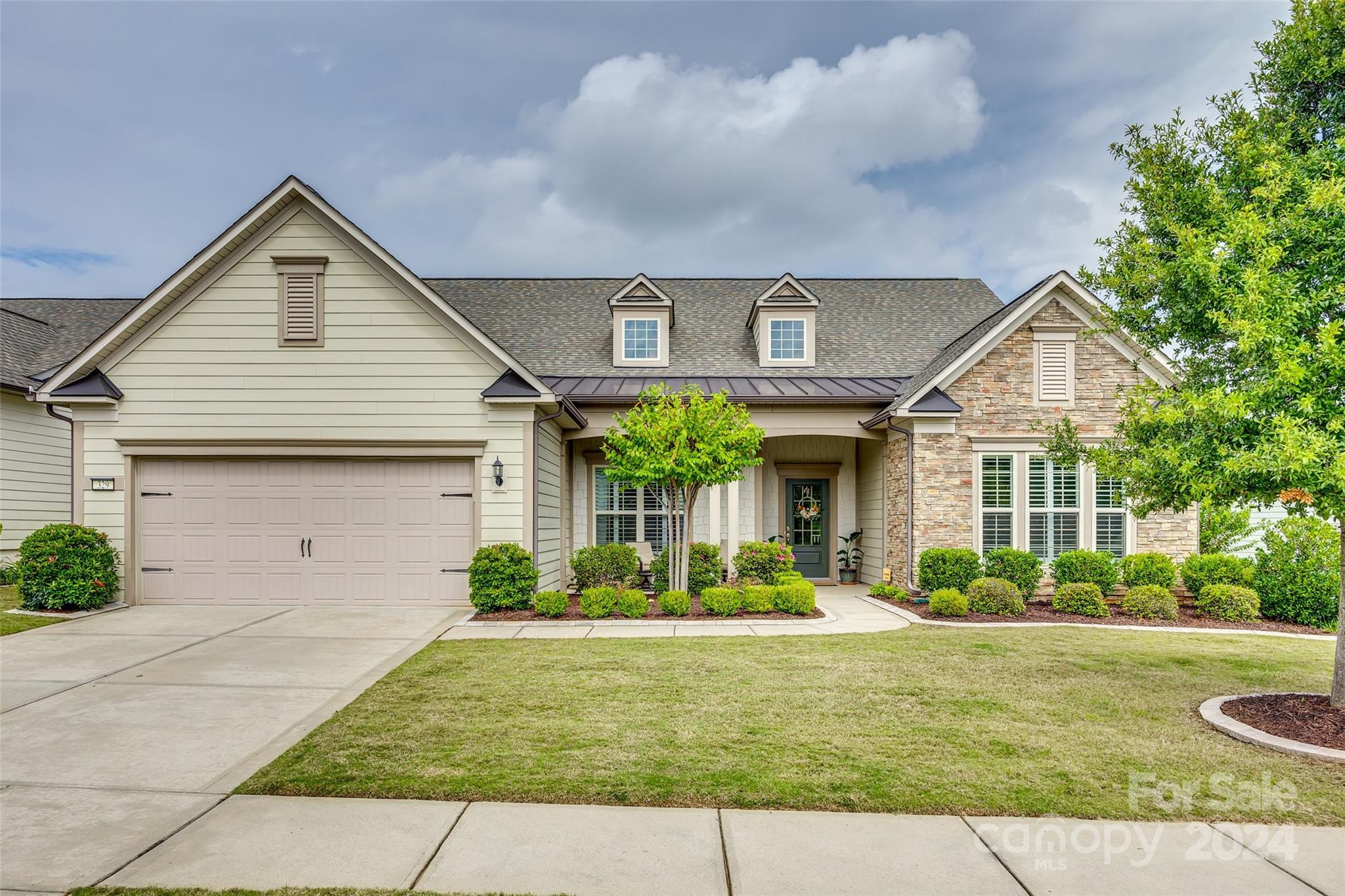 Welcome to Carolina Orchards, an active adult 55+ community! This beautiful home is ready to capture your heart with ALL the great upgrades! Spanning 2916 sq ft, the Dunwoody plan showcases a sophisticated open floor plan designed for seamless entertaining. The kitchen boasts dbl ovens, gas stovetop, ss appls, under cabinet lights, lg kitchen island & pantry w/ custom shelving. The office has French glass doors. Elegant primary ste w/ tray ceiling, spacious walk-in closet, en-suite bath w/ dual vanity & tile shower. The possibilities are endless upstairs w/ the sizable bonus rm along w/ a huge walk-in floored storage area over the garage. Step outside to your maintenance-free backyard. Relax on the private covered lanai to watch the big game or grill out & have dinner on the patio. This home is nestled w/in a community that offers resort-style amenities, including a clubhouse, tennis, pickle ball & bocce courts, fitness center, indoor/outdoor pool, ballroom, meeting rms & so much more!