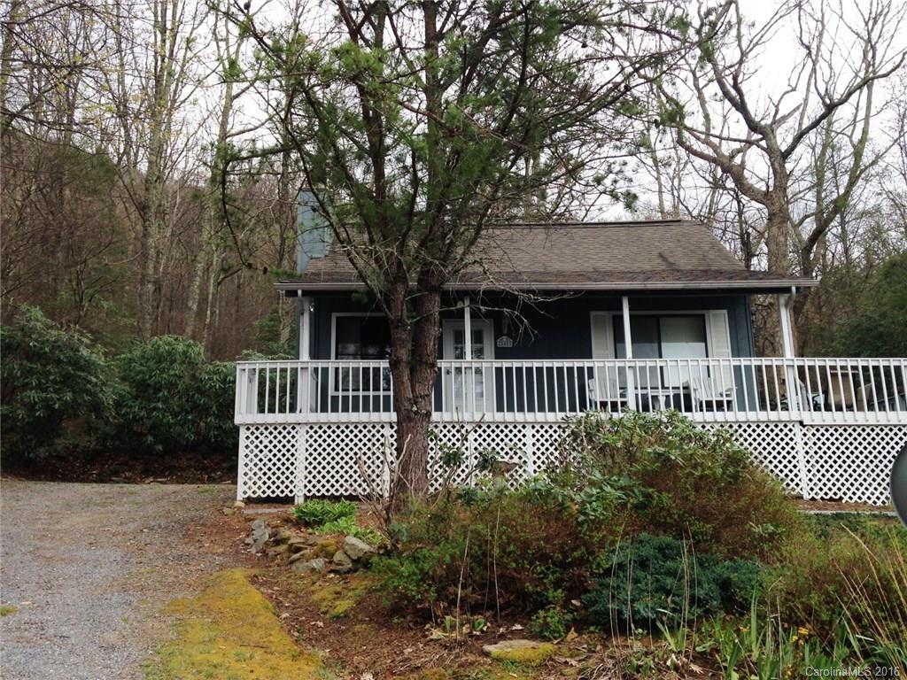 Live up high and enjoy the cool and mountain views. Lovely cabin/bungalow. In excellent condition. 2BR/2BA home plus sleeping loft. Covered front deck and large wrap around deck. There is a hot tub on the side porch. This home is made for outdoor living and enjoying the cool mountain breezes. Furniture is negotiable.