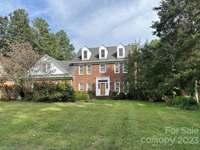Beautiful Full Brick home on a spacious and private, fenced lot.  Hardwood floors in formal Dining room and Foyer.  Den features gas fireplace, carpet, custom built-in bookshelf and a door to the large sun porch.  Kitchen features granite counter tops, pecan colored cabinets, center island, eat in area and door to the large sun porch.  Stairs in kitchen lead to large bonus room with custom built-in cabinets.  Primary suite features vaulted ceiling, dual sinks, tub and separate shower.  Beautiful sun porch and deck overlook the backyard and is great for entertaining.  Backyard is fenced in and private.  Come see this beautiful home and neighborhood located close to UNCC, I-485, I-85, I-77, light rail, Concord Mills, community access to The Mallard Creek Greenway and so much more!