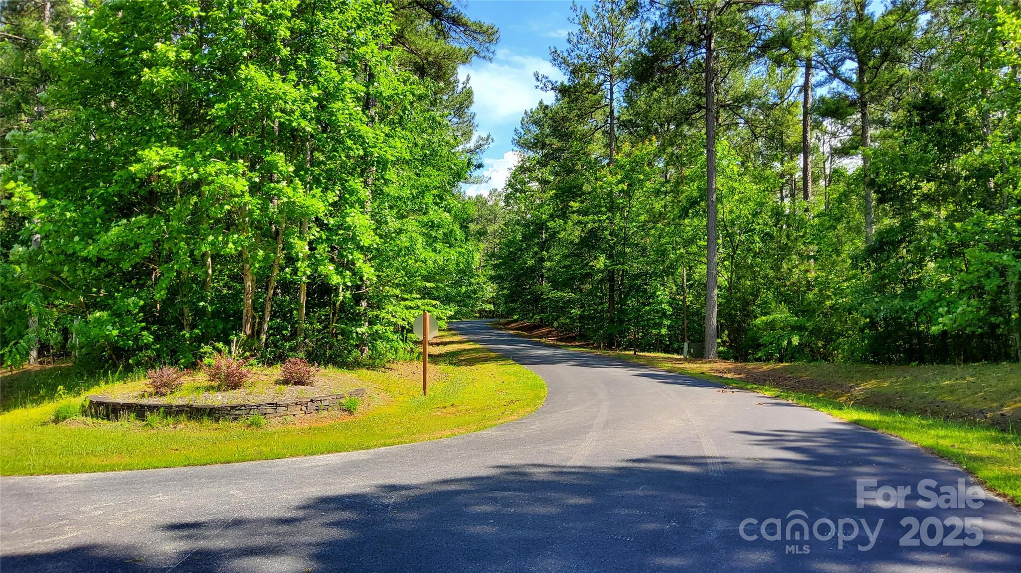 THREE PREMIUM BUILDING LOTS OF 5 PLUS ACRES in Ridgeview Subdivision in the Foothills of North Carolina.  Property is  level & would be so easy to excavate for a home in a lovely wooded/country subdivision of tall pines & hard woods on a private street. Total acreage is 5.93 acres.  Property is only 3 miles from Ingles Grocery Store/Gas station.  No steep curvy mountain roads to navigate here. This area is called the ISOTHERMAL BELT & is a zone in western NC foothills w/milder temperatures contributing to longer growing seasons than in the immediate surrounding region. The phenomenon usually occurs on the southern slopes of mountains & foothills protected from frost & freezing temperatures by higher mountains to the North & Northwest.  Enjoy summertime outdoor activities close by such as hiking, golfing, swimming, kayaking, horse-back riding & zip-lining.  The Tryon International Equestrian Center is a 20 minutes drive for equine enthusiasts.  Ideal location of a fulltime or vacation home.