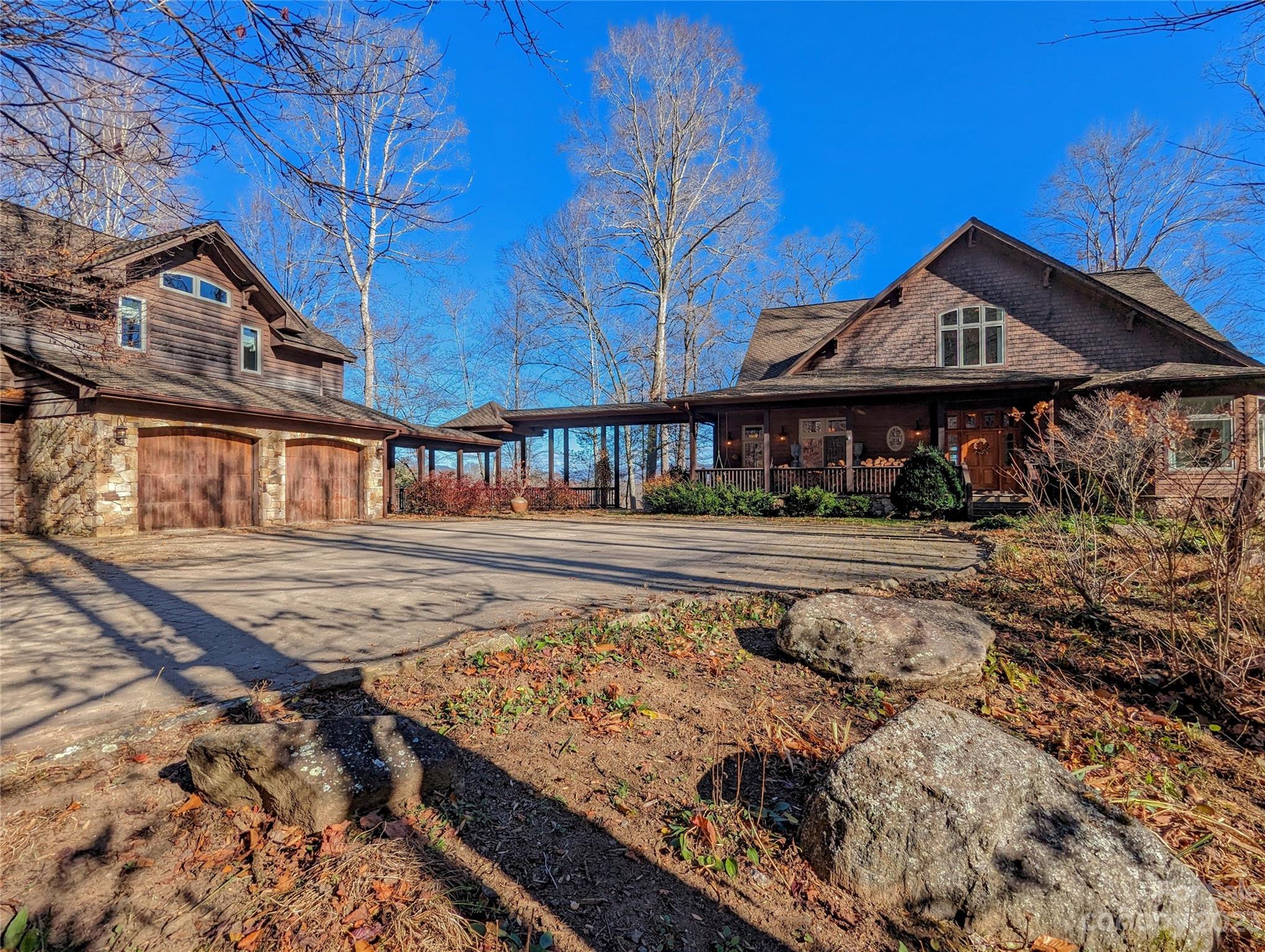 A True Haven...this property offers not only 329 Acres plus a luxurious 4BR/3.5 BA Main Residence w/spacious covered breezeway connecting to 2 car garage + ATV garage w/studio apartment second level w/additional facilities you'll love!  Unique Equestrian amenities include the Pine Grove Caretaker's Cottage, heated Barn w/half bath & all the essentials desired for your horses use and care, including riding ring for equestrian enthusiasts, plus attractive wooden board fencing around pastures.  Cozy and Charming Raven's Roost BR/BA Log Home was reconstructed with 1860's circa logs and overlooks a spacious stocked pond with a tranquil waterfall at entrance of Cave. Exquisite craftsmanship throughout!  Massive roadways built and lead to numerous potential homesites or great as horse trails. Underground utilities include fiber for internet service.  Sellers will sell w/less land per Exhibit "A" attached. You won't want to miss out on this opportunity to own your slice of paradise!
