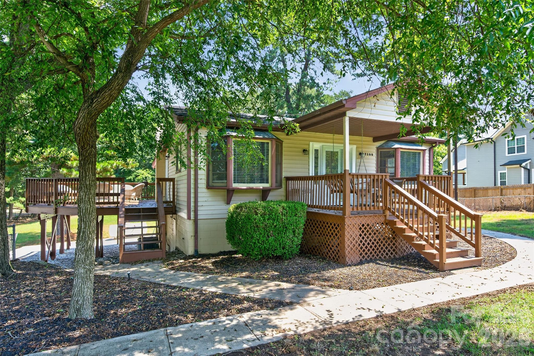 This remodeled 3 bedroom, 2 bath home with a flex room and a full bath in the basement 2nd living quarters on a total of 1.11 acres between the 2 adjacent parcels is being sold together.  The home is attached to a 3 bedroom septic system.  The home has a nice pool and a detached 648 sqft garage.  326 sqft of the main level is less than 7 ft ceilings and is counted as additional heated square footage over and above the 791 main level heated living (HLA) area and over and above the total property HLA of 1156 sqft.