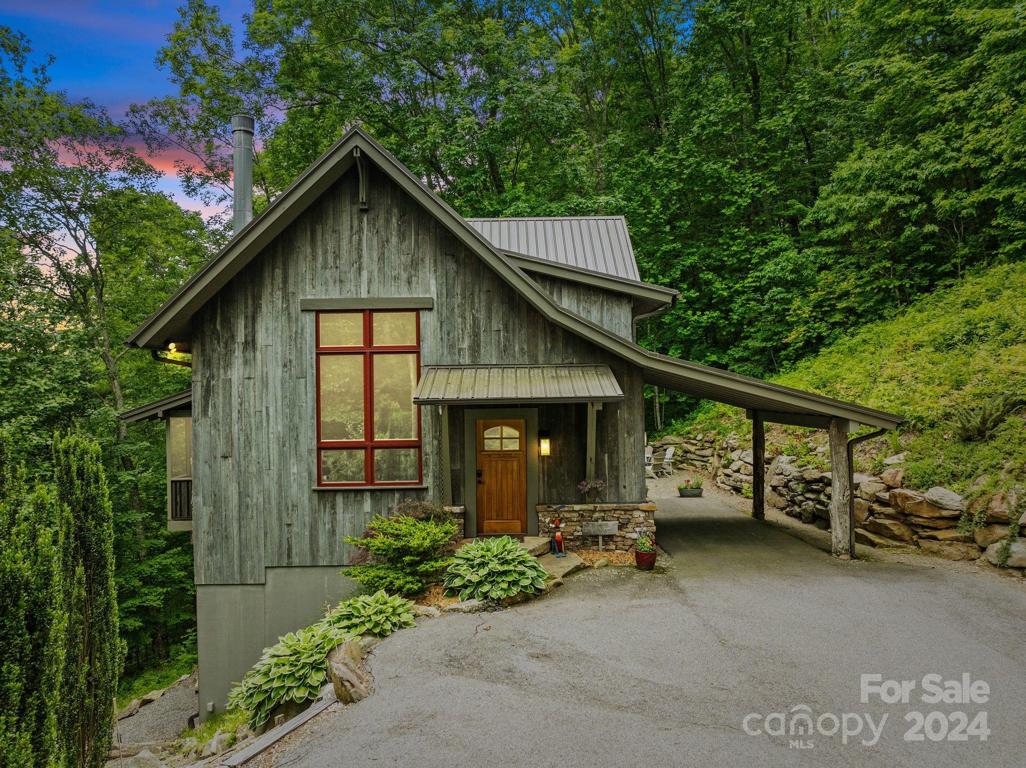 Nestled amidst towering trees and surrounded by the tranquil embrace of nature, this stunning custom Jade Mountain Builders timber frame home stands as a testament to timeless craftsmanship and modern elegance. Located in the highly desirable Fairview Forest. With its exquisite craftsmanship, unparalleled attention to detail, and idyllic setting, this custom timber frame home offers a rare opportunity to own a slice of paradise where every day feels like a retreat. Don't miss your chance to make this dream home a reality. Schedule your showing today and experience the magic for yourself!