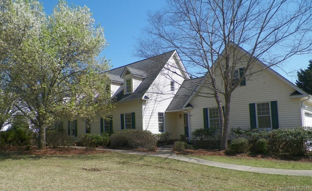 Don't miss this spacious and attractive 2 story house located on a corner lot.  First floor features a sunny kitchen with breakfast area, den with fireplace, formal living and dining room, laundry with work sink, half bath and entry with staircase leading to second floor master bedroom with master bathroom and dressing area, two additional bedrooms with full hall bathroom, and bonus room over the garage.  Fenced back yard, rear deck and 2 car garage. New stove and DW, freshly painted interior.