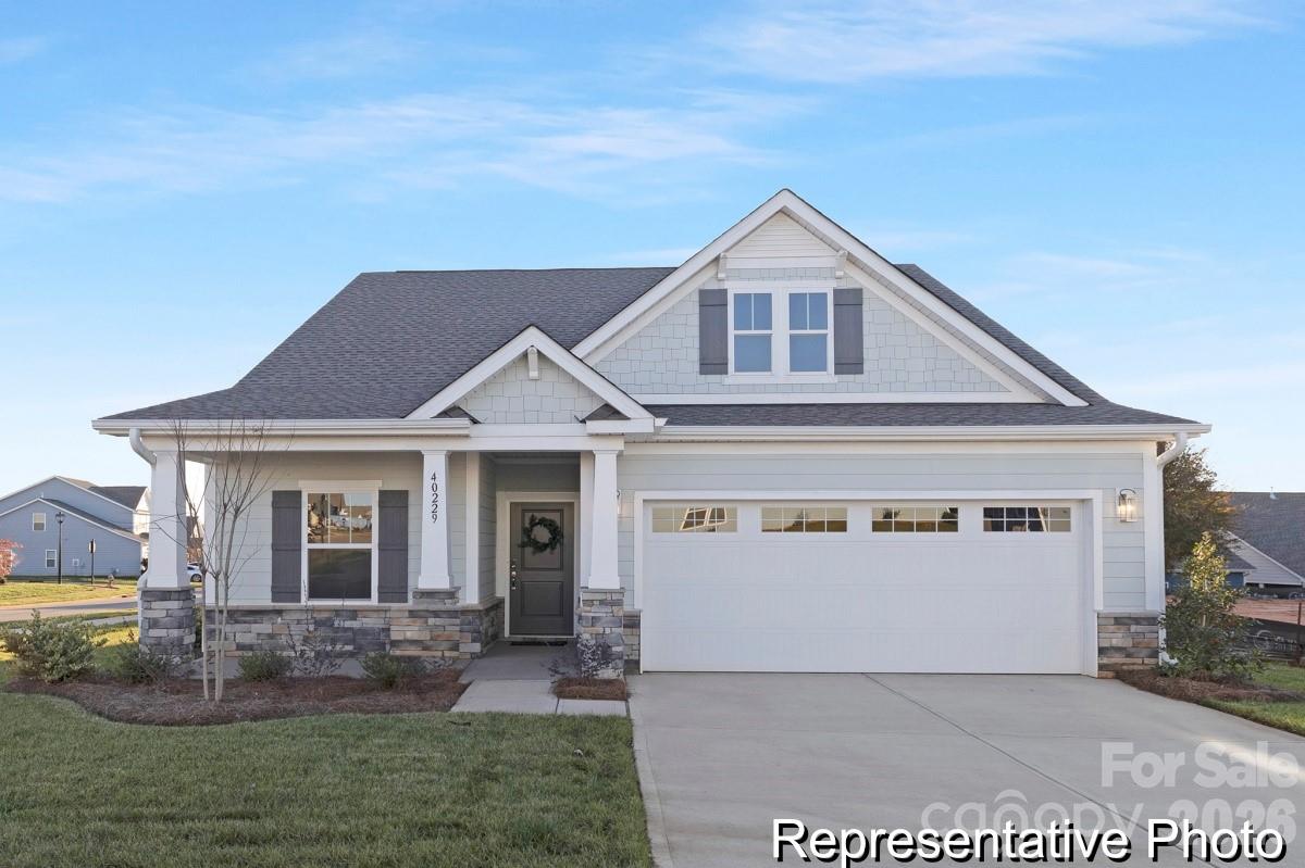 This quick move-in semi-custom home offers approximately 1,651 sq ft, 2 bedrooms, and 2 bathrooms with a functional, open layout on main level with versatile bonus room on second level. The main level features a welcoming foyer leading to secondary bedroom, laundry room, Great Room, Dining Area, and well-appointed Kitchen. The Primary Suite is conveniently located on the main floor and includes a private bath with walk-in shower and a spacious walk-in closet. A laundry room adds everyday convenience. Upstairs, a versatile bonus room provides flexible living space. Designed with upgraded features, this home offers comfort and efficiency for modern living. Located in the Edgewater Golf Course Community with pool, clubhouse, boat docks, and walking and biking trails—an exceptional opportunity for comfort, flexibility, and lifestyle.