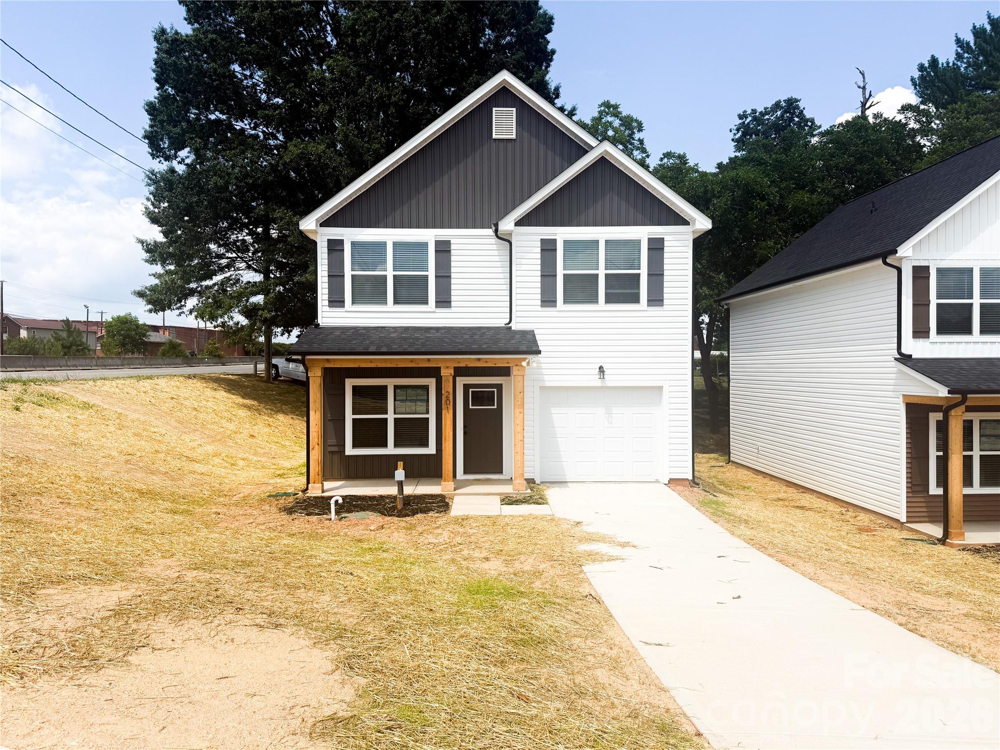 Move-in ready new construction home featuring 9-foot ceilings, LVP flooring throughout, and a stylish kitchen with stainless steel appliances and tile backsplash.
This modern home offers a 1-car garage and contemporary finishes. Conveniently located near Irish Creek Golf Course, downtown Kannapolis, and Landis.
Perfect low-maintenance living in a brand-new home!