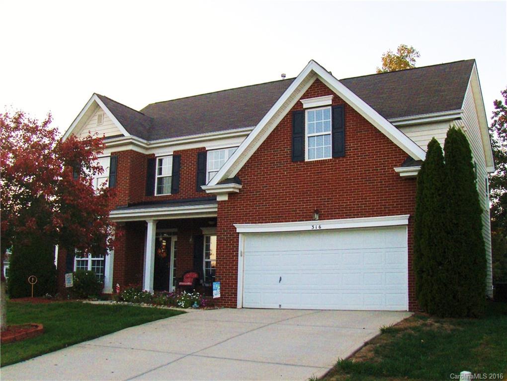 Stunning home w/4 bedrooms, 2.5 baths, corner lot in Rhyne's Trace. Former model home. Hardwood floors in kitchen, breakfast room and foyer. Formal living room, dining room. Den w/gas log fireplace, custom built-ins. Large kitchen with granite countertops. Upstairs is a spacious loft plus bonus room. Over 2900 square feet in an up and coming neighborhood conveniently located near I-85. New metal fence in backyard. Gorgeous stamped concrete patio w/gas grill.