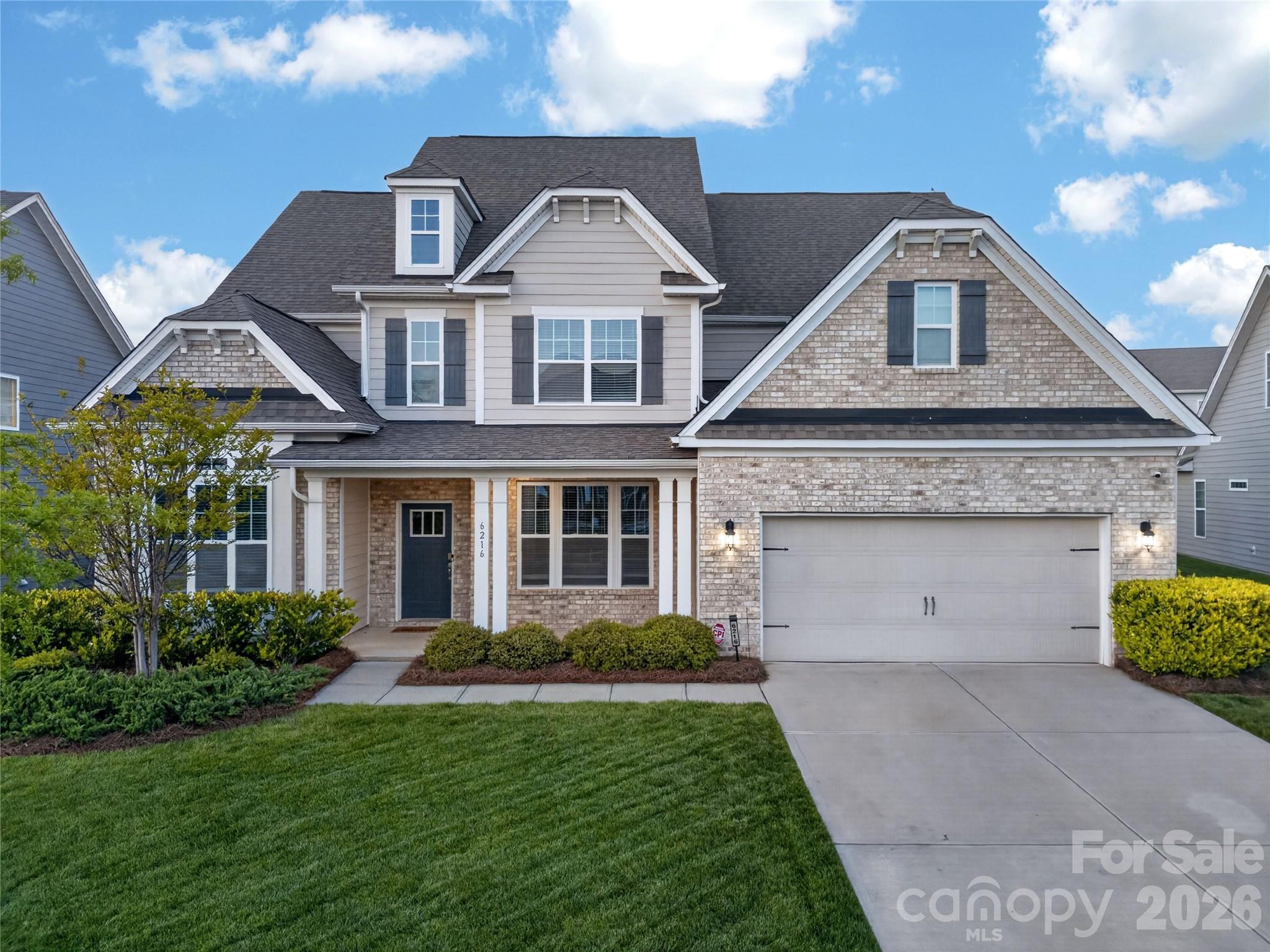 Situated on a premium lot in Indian Land’s HOT Avondale community, this custom built Waybury plan has been meticulously updated and is move-in ready.  A grand 2-story foyer flanked by both formal dining room and study with 15’ ceilings leads to the open concept heart of the home.  Gourmet chef’s kitchen features ample 42” cabinets, granite counters, Kitchenaid appliances including double wall oven, 5 burner gas cooktop and oversized island.  Relax or entertain in either the flexible living room or oversized great room.  Convenient first floor guest suite on the main includes sitting room and attached bath.  Enormous primary suite offers sitting area and spa-like bath with separate dual vanities, glass enclosed tile shower, garden tub and huge walk-in closet.  Bedroom three has a private en suite bath while bedrooms four and five (presently used as a home gym) are connected by a Jack n Jill bath with dedicated private vanity areas.  Generous bonus room on second floor.  Covered outdoor patio overlooks fenced flat backyard with mature privacy landscaping.  Conveniently located moments from premier shopping, dining and entertainment with resort like amenities including pool, clubhouse and pickleball courts, this is a must see!