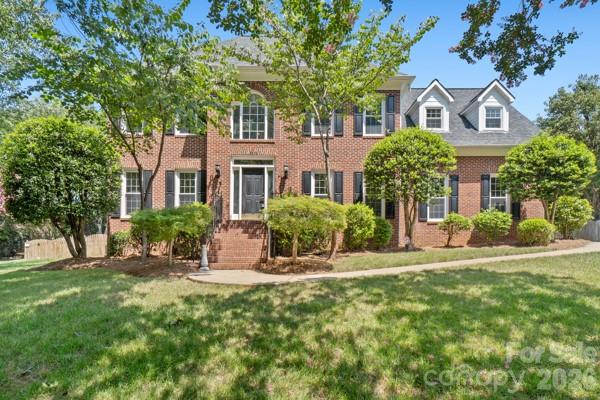 Beautiful Hembstead Subdivision! Hard to find in this convenient location to shopping and restaurants.  Make this home your own!  Some updating needed. New windows! Lovely full brick home on more than 1/2 acre.  Fenced rear yard with large deck for entertaining!  Walk in to Living Room and Dining room, Family room with fireplace and gas logs.  Kitchen open to breakfast. 1/2 bath and laundry room just inside garage for convenience.  Large Master suite upstairs along with 3 other bedrooms.  Subdivision has pool, walking trails and tennis courts.