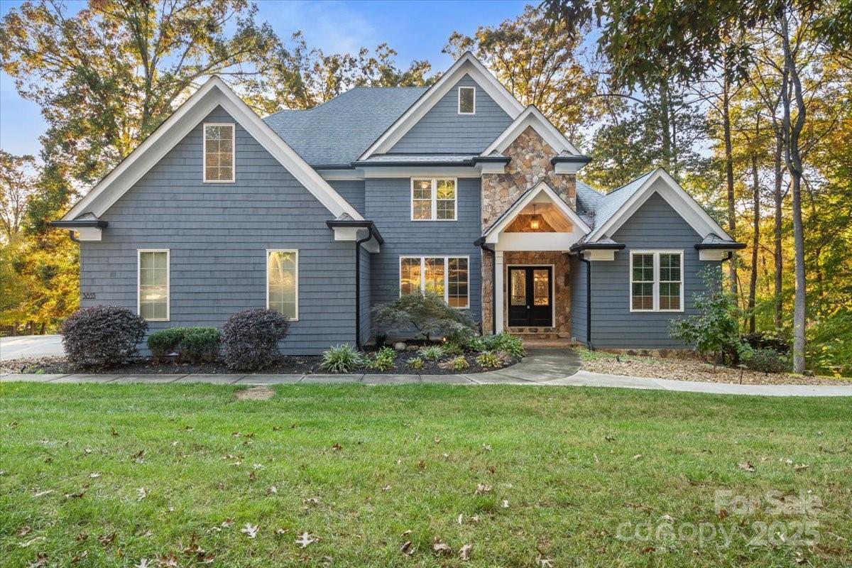 Brand new Price Improvement of $100,000, When you enter this stunning Lake Norman, NC home situated on 1.6 acres just ten minutes to Mooresville N.C. and 5 minutes to Sherrills Ford, you will see it features far too much to list here, including a full second living quarters, 2 beautiful kitchens and bathroom accommodations in the walkout basement level, tremendous amount of space on all three levels totaling 6286 sqft of room to spread out and entertain with two full kitchens, the huge covered dock on deep water was built in 2018, backyard pavers and walkway to the pier with levels throughout the yard offers a nice tree shaded area to celebrate the Lake Norman Life of your dreams, the master suite offers a walk in shower and a garden tub bath for relaxing after a long day on the water, the main kitchen has two full size ovens and full size fridge and a full size freezer nestled into beautiful cherry stained cabinetry, there is an unfinished area in the basement for a shop and storage.