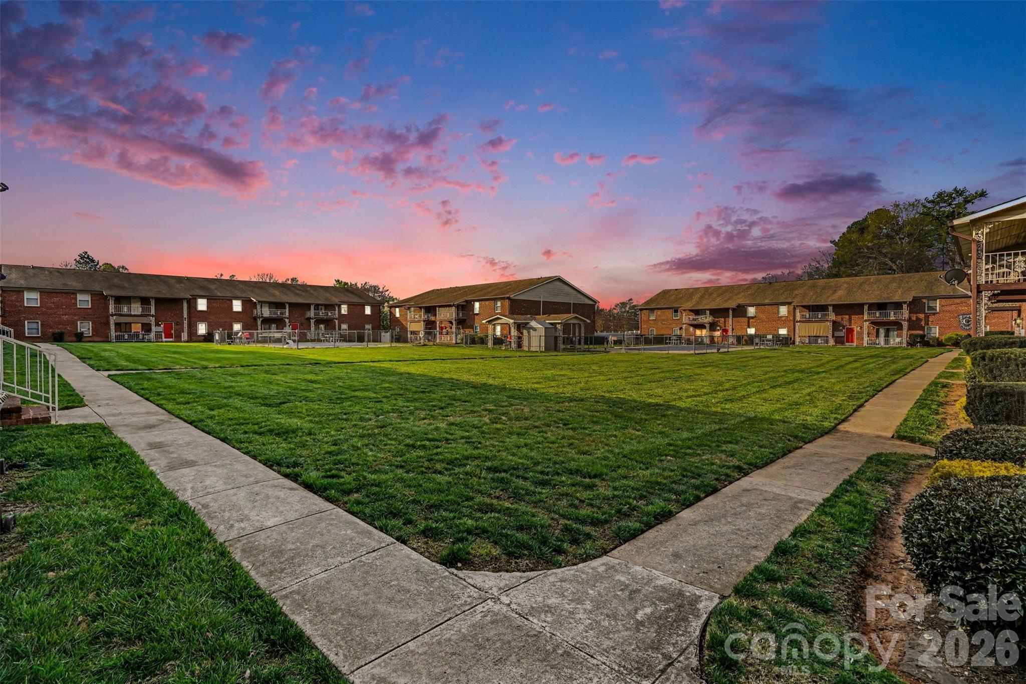 Rare opportunity to own a spacious 3-bedroom, 3-bath condo in the Carriage House community in Kannapolis. With over 1,900 square feet of single-level living, this home offers the space and flexibility of a single-family home with the convenience of low-maintenance condo living.

Inside, you’ll find an updated interior featuring luxury vinyl plank flooring and a modern kitchen with quartz countertops, stainless steel appliances, marble mosaic backsplash, and recessed lighting. The thoughtfully designed split-bedroom floorplan includes two large primary suites, each with its own full bathroom, making this an excellent option for multi-generational living, families or overnight guests.

The home also features two spacious living areas, an updated hall bathroom, and a 3rd bedroom ideal for storage, office space, or hobbies. Step outside to enjoy 2 private balcony spaces, including one with views overlooking the community pool.

Enjoy amenities including two community pools, sidewalks, and maintained grounds, with HOA dues covering exterior maintenance for easy lock-and-leave living. The home includes two assigned parking spaces and additional storage.

Conveniently located just minutes from Downtown Kannapolis, Kannapolis Cannonballers Baseball Stadium, shopping, dining, and I-85, with quick access to Concord Mills, Charlotte Motor Speedway, and an easy commute to Uptown Charlotte.