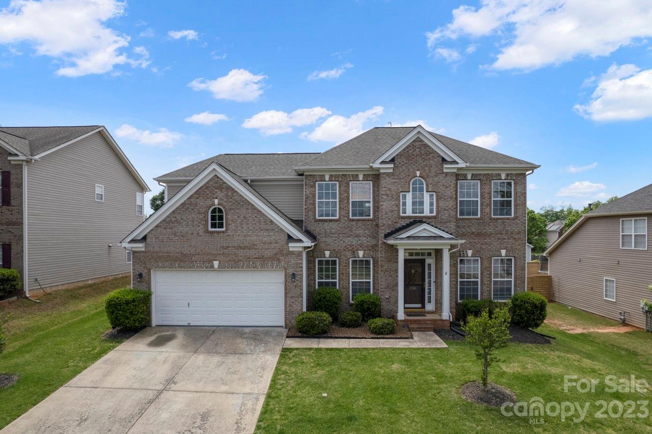Great Indian Trail location.  Open floorplan with a room to the left which could be an office or play area.  Primary bedroom on the main floor.  Two story Greenroom with fireplace. Updated kitchen, black cabinets, granite countertops, and tile backsplash.  Secondary bedrooms with bonus room on the 2nd floor.  Fenced yard.