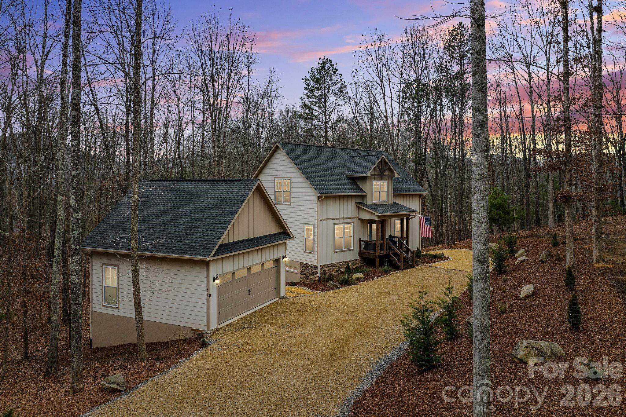 You might be looking for a home that doesn’t require compromise—one that feels finished, intentional, and ready the moment you arrive. If that’s the case, this immaculately maintained, FULLY FURNISHED mountain retreat in French Broad Crossing may be exactly what you’ve been waiting for. Built in 2022 and thoughtfully updated since, the home invites you to settle in without a to-do list. Fresh paint and new flooring create a clean, modern backdrop, while upgraded kitchen appliances and washer/dryer make everyday living effortless. The redesigned primary bathroom feels like a quiet retreat—designed for unwinding, not rushing.
With a 4-bedroom septic already in place, the lower level offers flexibility and intention. The game room easily converts to a true fourth bedroom, while the dedicated home theater creates a space where movie nights, game days, and evenings in feel just as memorable as time spent outdoors.
Set on just over two acres and surrounded by a lush, wooded backdrop, privacy comes standard here. Mornings are quiet, evenings are peaceful, and the setting feels intentionally removed—yet never isolated.
Living in French Broad Crossing also means access to experiences that extend well beyond your front door: a grand lodge for gatherings, a river-view pool overlooking the French Broad, a fitness center, Tree House Park, and miles of beautifully maintained private hiking trails. It’s a community designed for those who value both luxury and nature, without having to choose between the two.
Nothing needs to be done. Nothing needs to be added. All that’s required is your arrival.
Welcome home to French Broad Crossing!