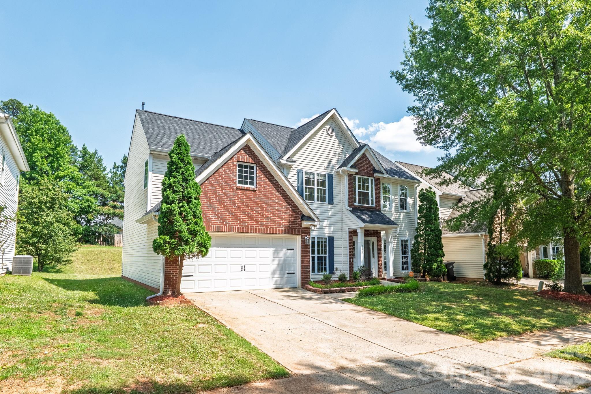 Beautifully updated 4-bedroom, 2.5-bath home with modern finishes throughout. Features include a renovated kitchen with quartz countertops, a large center island, updated cabinetry, a ceramic backsplash, hardwood flooring on the main level, engineered wood flooring upstairs, porcelain tile in the bathrooms and laundry room, and a porcelain fireplace accent wall. Recent updates include a new roof and a newly installed HVAC system. Located near I-485, Highway 16, Northlake shopping, dining, and Uptown Charlotte. Move-in ready and ready to enjoy.