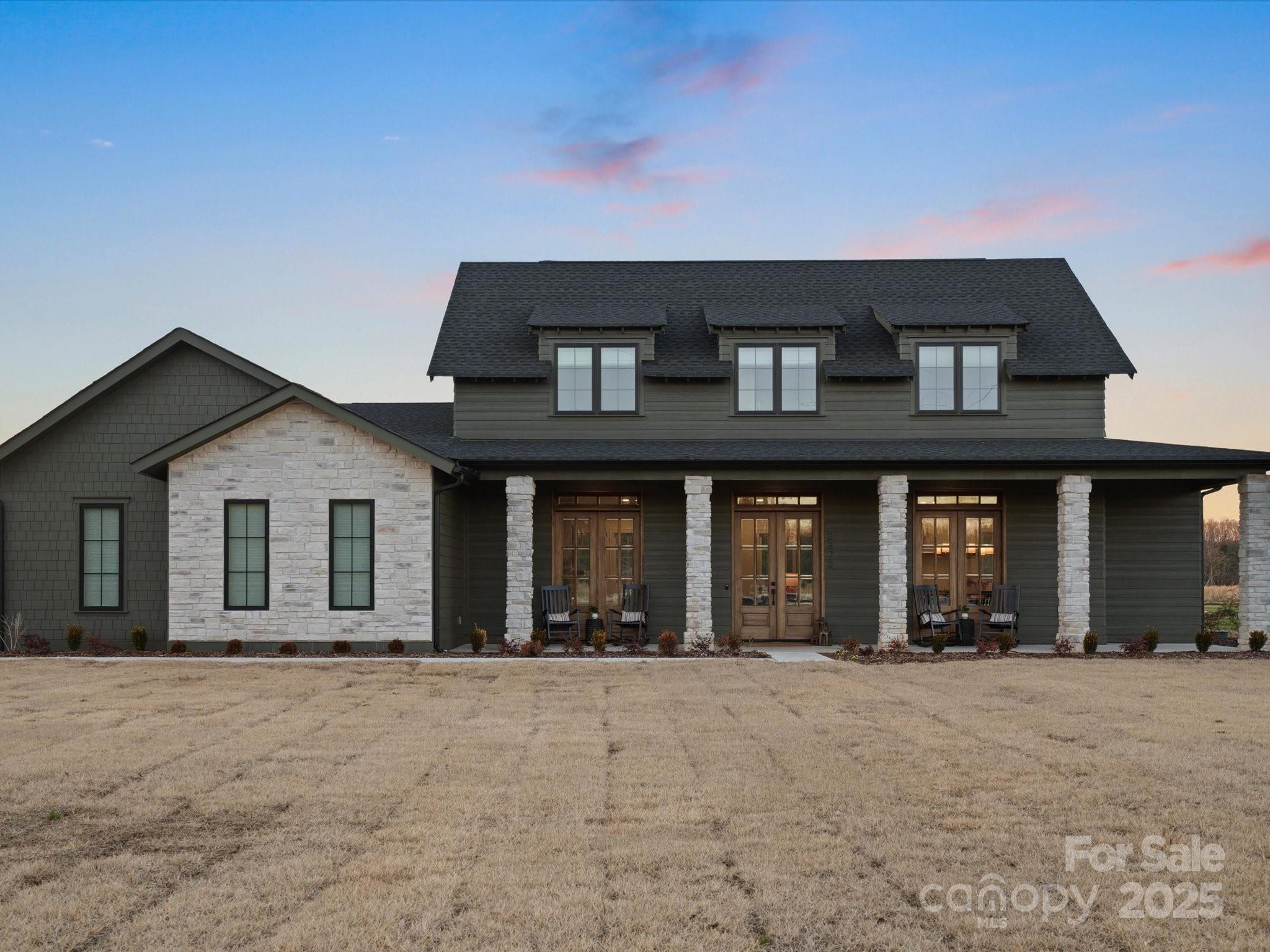 Welcome to Lowland Meadows in Rock Hill SC! Built in 2024, this exquisite like-new home features 4 bedrooms, 3.5 bathrooms, a 3-car garage, and sits on a generous 1-acre lot. With expansive living and dining areas, a dedicated home office, a primary suite tucked away on the main level, and secondary bedrooms on the second level, it's a combination of comfort and functionality for everyday living. The large double front and rear patio porches define indoor-outdoor living. Enjoy sipping coffee on the front porch watching the sunrise, or relaxing in the evening on the back patio at the end of a long day. Make this stunning home in Lowland Meadows your own today!