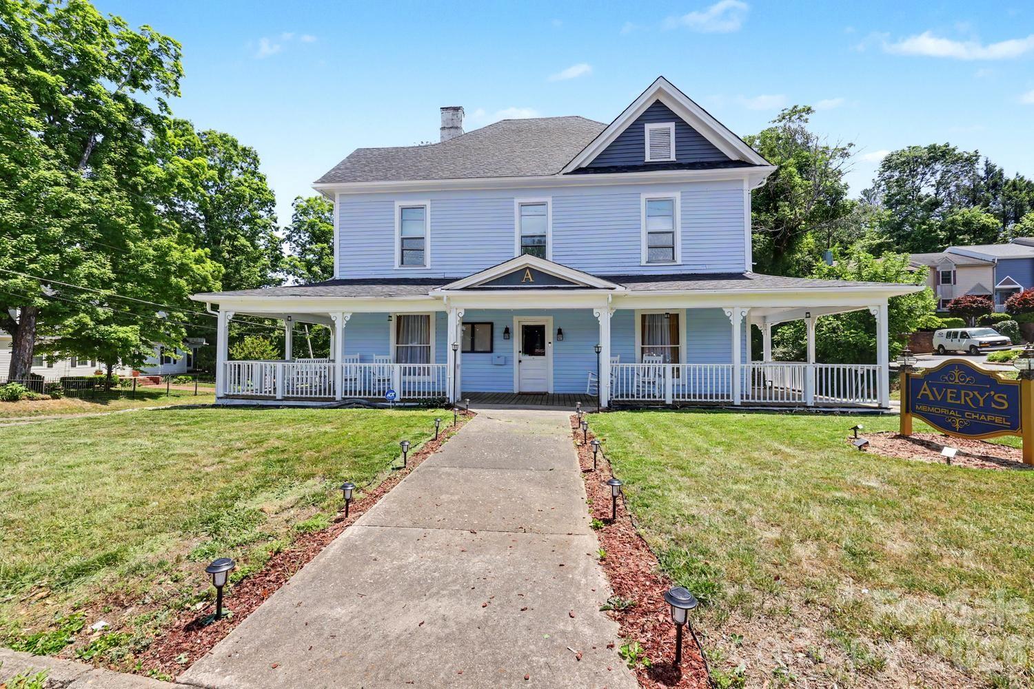Currently operating as Avery’s Memorial Chapel of Lenoir, this unique property offers a wide range of potential uses. Situated on the edge of a charming neighborhood, it showcases classic Southern character with high ceilings and painted hardwood floors throughout much of the interior, creating a bright and open feel.

The main level features an office, a half bathroom, and five versatile rooms that can be adapted for various purposes—such as office space, retail displays, or whatever suits your vision. A grand staircase leads to the second floor, where you’ll find an additional bathroom, two more rooms, and a spacious front room filled with natural light.

Positioned on a prime corner lot, the property includes ample parking, with a driveway alongside the building leading to a rear parking area that offers a separate entrance. Come see the possibilities for yourself!