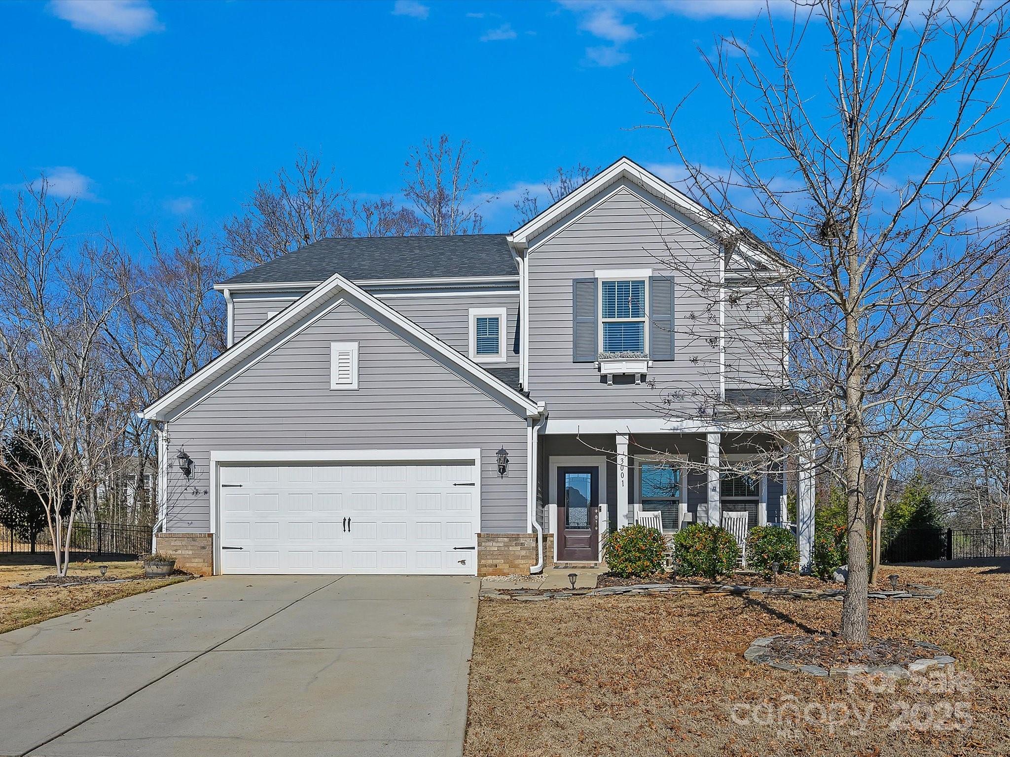 This home is sure to impress!  As you enter you're greeted by tray ceilings and shiplap accent walls.  The open floor plan is highlighted by beautiful light fixtures and a gourmet kitchen with an oversized island and butler's pantry - and the walk in pantry is huge.  The living area hosts a cozy fireplace and there is a mud room hidden away as you come in from the garage.  Upstairs the loft is a great gathering space and the primary retreat is everything you could dream of, with a spa like bathroom and a vast walk-in closet that has it's own access to the laundry room. But the crown jewel is the back yard - one of the larger lots in the neighborhood, it's private and wooded and boasts a pool with a peaceful waterfall and a firepit area. Life at the end of this cul-de sac couldn't get any better, with Fort Mill Schools and about a 20 minute commute to uptown Charlotte.