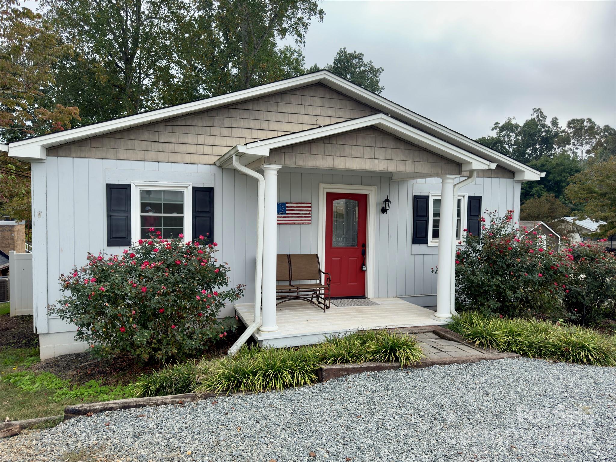 Looking for the perfect lake getaway or maybe an already successful Air B&B investment?? Look no further!! This adorable waterfront cottage situated on High Rock Lake comes fully furnished and ready for instant enjoyment!! Fabulous location, deep water, access by water to restaurants & marinas, plus your own private dock & pier. Gorgeous outdoor space features paver walkway leading to patio w/firepit and bonus "cabana room" with 2 separate bunk lofts, kitchenette & sitting area...perfect space for additional guests or just hanging out by the water. Interior features include living room w/vaulted ceiling & stunning views, hardwood floors, 2 bedrooms; primary w/private bath, kitchen w/tiled backsplash, main bath w/tiled shower & utility room that could also serve as additional sleeping area. Spacious deck overlooking the lake, fenced yard, storage shed, outdoor shower, pella windows & sliding glass door. Private community boat ramp (optional $75 per year). This one won't last long!!