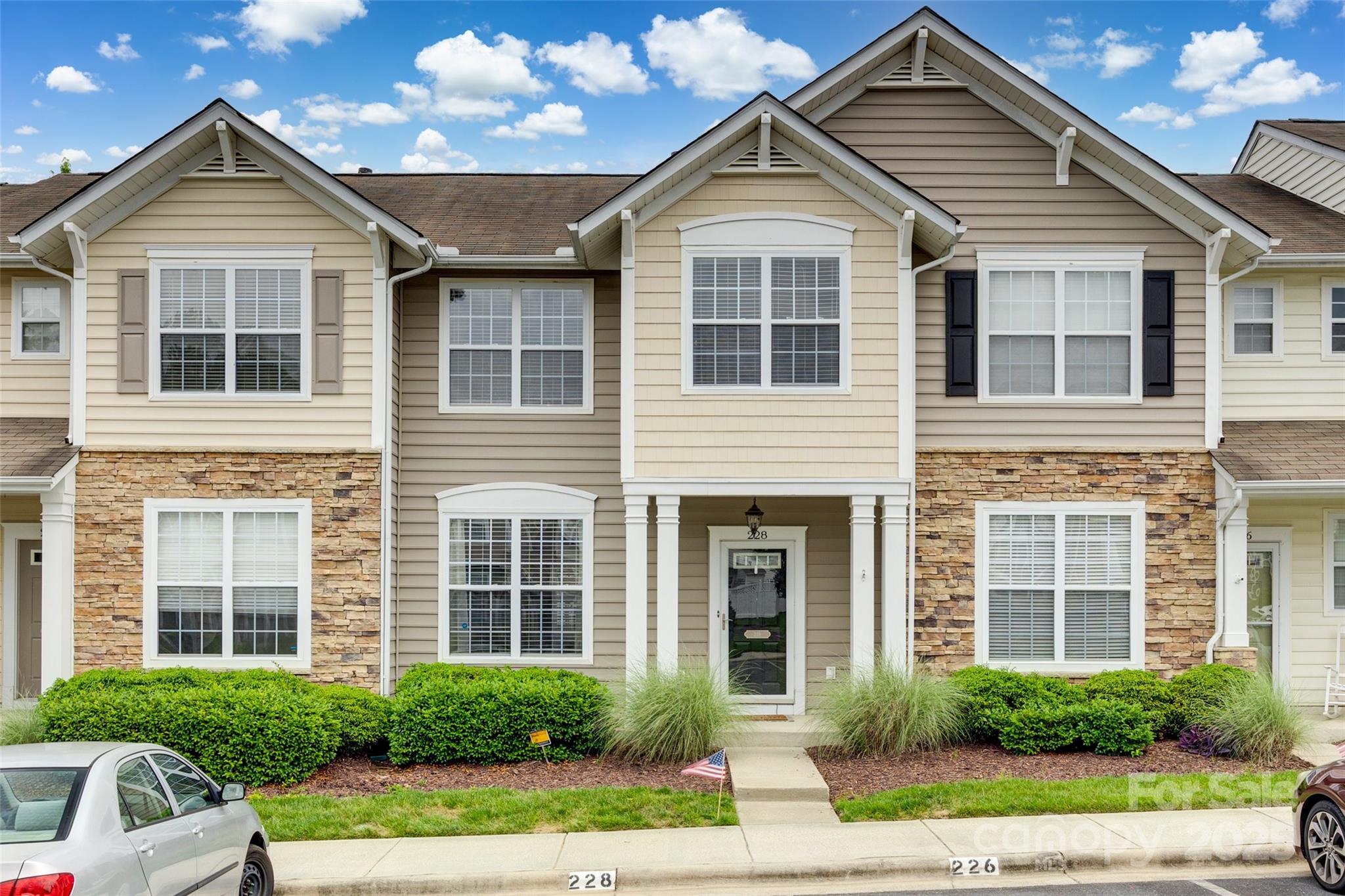 Don't miss this adorable townhome in Fort Mill.  Living Room with gas log fireplace, 3 bedrooms up - 1 being primary ensuite, and laundry in the upper hall with split bedroom set up.  Enclosed/fenced back yard that has landscape updates scheduled for week of June 3.  Patio table, umbrella convey as well as appliances in the home convey (there is no washer/dryer to convey). 2 dedicated parking spots, private community pool and cluster mailboxes make this a perfect location and opportunity with easy access to Charlotte, the Airport and South Park.