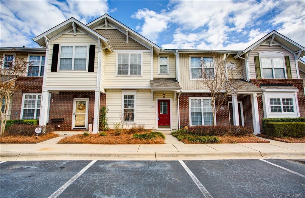 Welcome home to this cute 2 bedroom, 1.5 bath townhome. Many upgrades including wood flooring, newer carpet and stainless steel appliances. Living room with cozy fireplace and lots of natural light. Master bedroom with attached bath and walk in closet. Additional bedroom w/ walk in closet & laundry complete the upper level. Private patio w/ fenced yard & outside storage. Community pool & playground. Fort Mill Schools. Conveniently located near shopping dining, minutes from I-77. This won't last!