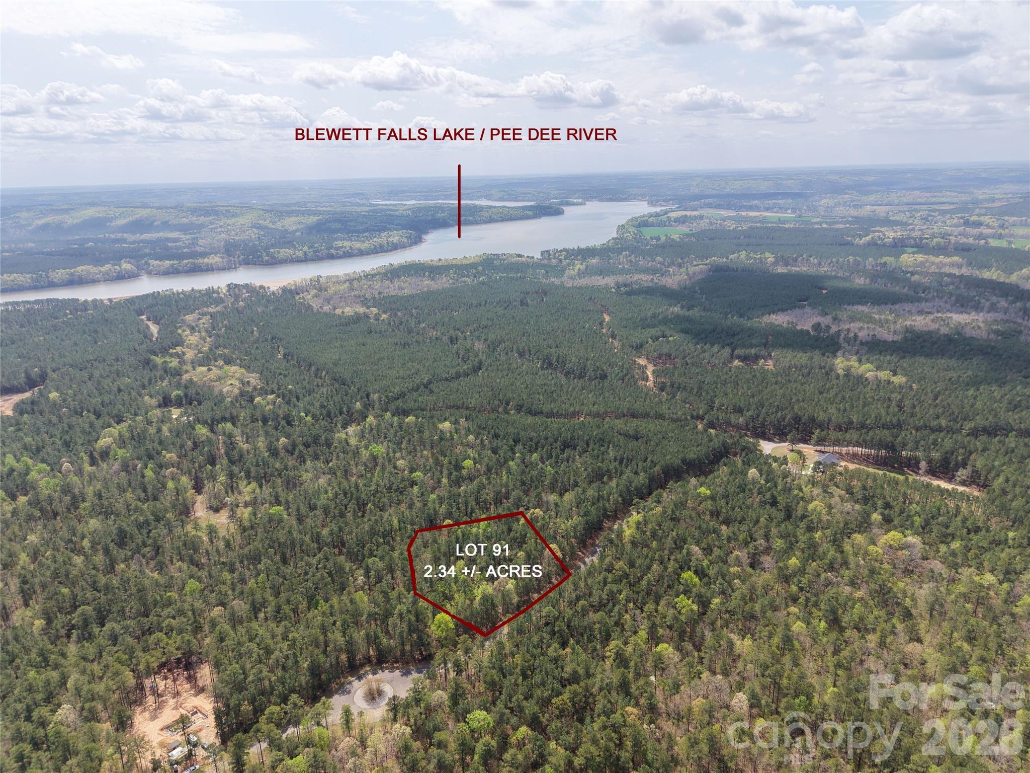 GATED COMMUNITY ON THE LAKE!!! BEAUTIFUL +/-2.34 ACRE LOT. Beautiful Potential Home Site Surrounded by Mature Hardwoods. Just a short walk off the back property line to a common area on the lake. 300+ Acre WILDLIFE MANAGEMENT AREA where Bow Hunting, Hiking and Horseback Riding are permitted. Perfect Blank Slate for your Dream House. Two Amazing Timber Framed Community gathering Pavilions one with Stone Fireplace, one screened with picnic tables and Bathhouse with shower. Fishing, Skiing, Kayaking, Canoeing & Swimming in a serene natural setting.