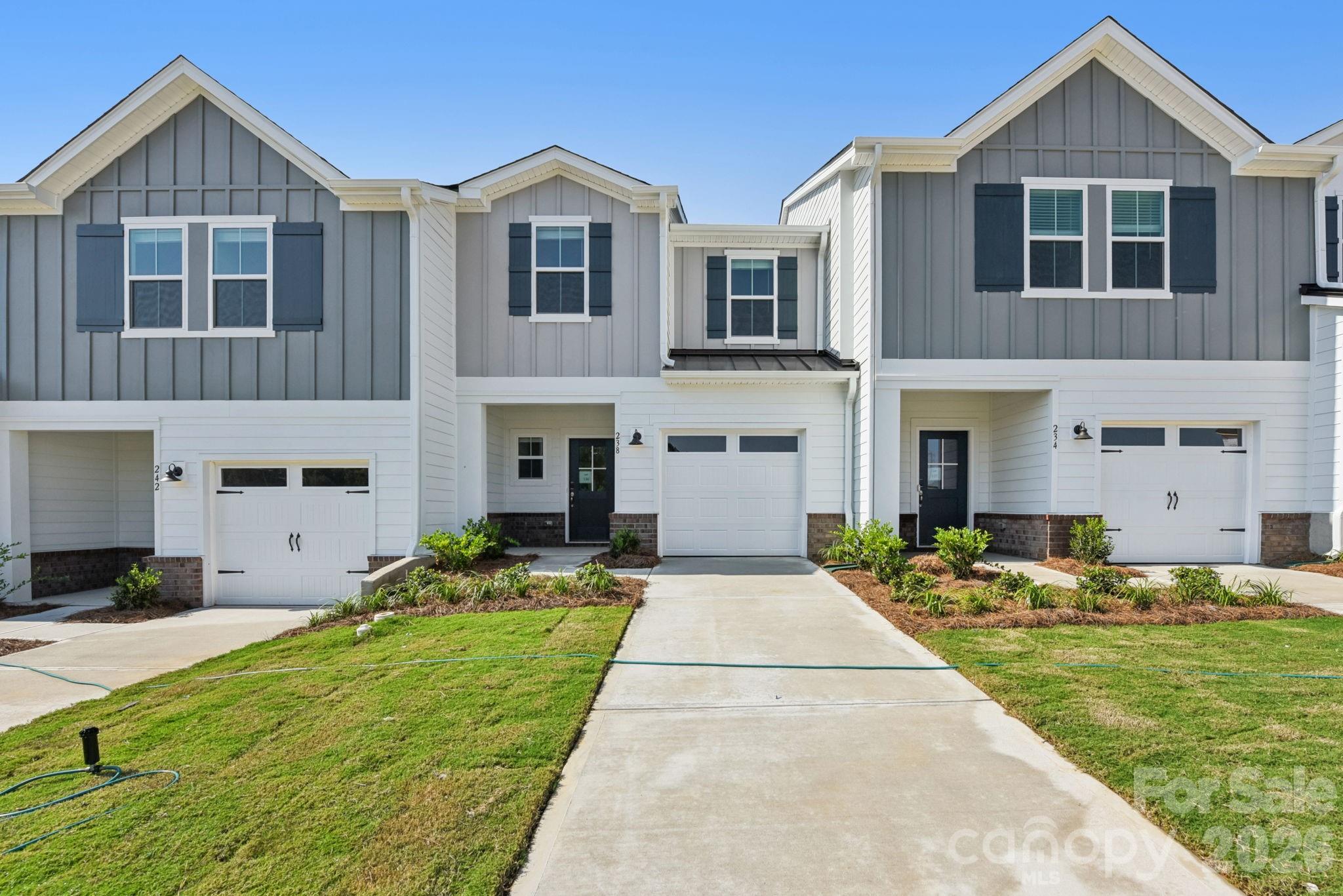 Brand new, energy-efficient home available by Apr 2026! Prep dinner at the kitchen island while mingling with guests in the open-concept great room. Upstairs, the spacious primary suite features dual sinks and a walk-in closet. A convenient second-story laundry simplifies the chore. New two-story townhomes in Fort Mill, SC bring low-maintenance and energy-efficient features to the area. With our move-in ready homes, you will find a washer, dryer, fridge and whole-home blinds, guaranteed to close in 60 days or less. Relax in your private primary suite and adventure to nearby Baxter Village and Uptown Charlotte.  Each of our homes is built with innovative, energy-efficient features designed to help you enjoy more savings, better health, real comfort and peace of mind.