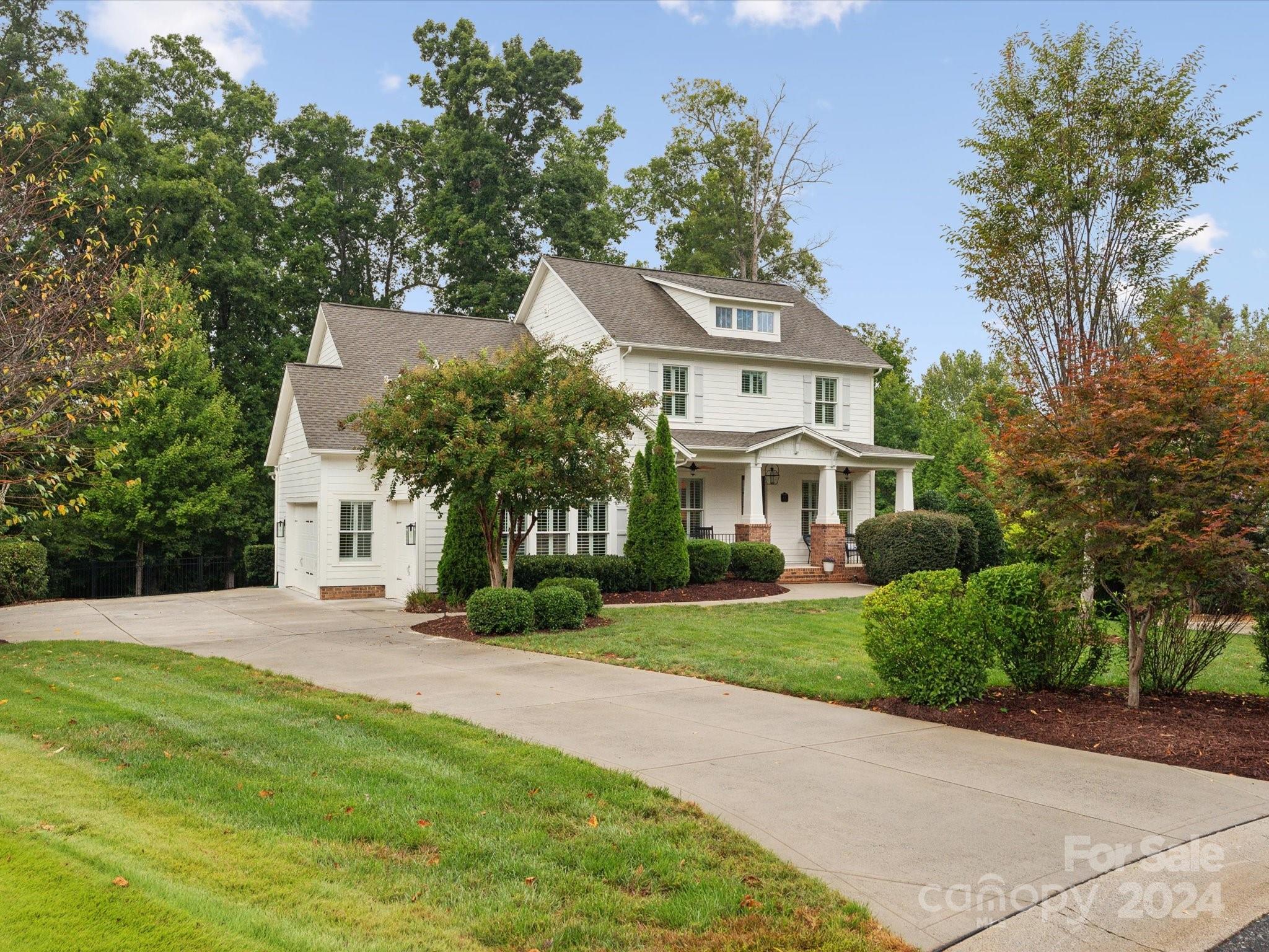 Don't miss this 4 bedroom/3.5 bath southern beauty in the highly sought after Springfield community! Home sits on a spacious lot in the cul-de-sac backing to woods. Main floor features an open floor plan - large kitchen island with wine fridge, office with built-ins, large walk in pantry, drop zone, laundry w/ designer floor tile & primary suite. Upstairs features a large loft area, bonus/media room off of loft area with a walk in attic, two bedrooms with Jack n Jill bathroom & an additional bedroom/bathroom. This home is an entertainer's dream with a rocking chair front porch, screened in back porch & two patio areas overlooking the gorgeous wooded fenced backyard. Tons of amenities including pools, clubhouse, playground, tennis/pickleball courts, pavilion, walking trails. HOA includes annual membership to Anne Springs Greenway -2100 acres of nature preserve- hiking, biking, horseback riding, dog park, kayaking. Floorplan attached.