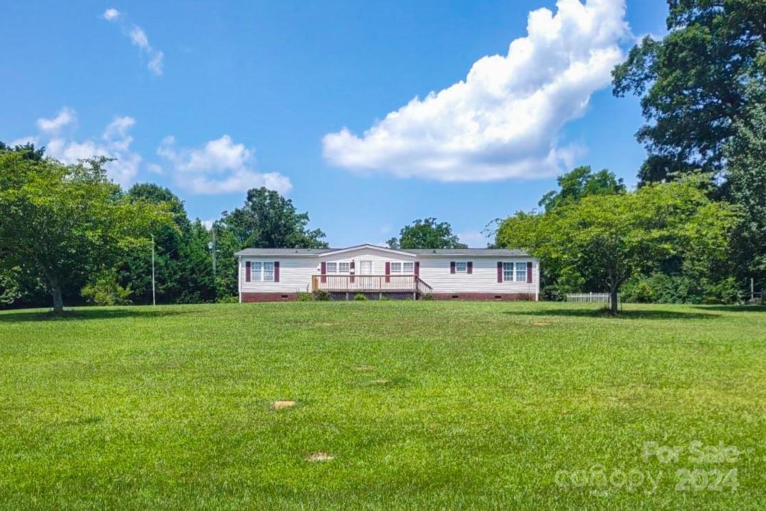 Welcome to your own private oasis on 38.5 acres of pristine countryside! This 3 bedroom, 2 bathroom home offers the perfect blend of modern comfort and rural charm. Enjoy the convenience of a 30x50 metal detached garage with 3 large entry doors and a fully functional RV hookup, ideal for hobbyists or outdoor enthusiasts. Explore the picturesque landscape via several tranquil paths that wind through the property, leading to delightful surprises like a chicken coop and lush gardens boasting pecan trees, blackberries, peach trees, and grapevines. With appliances just 3 years old, this property promises functionality. Don't miss the opportunity to make this exceptional retreat your own slice of paradise!