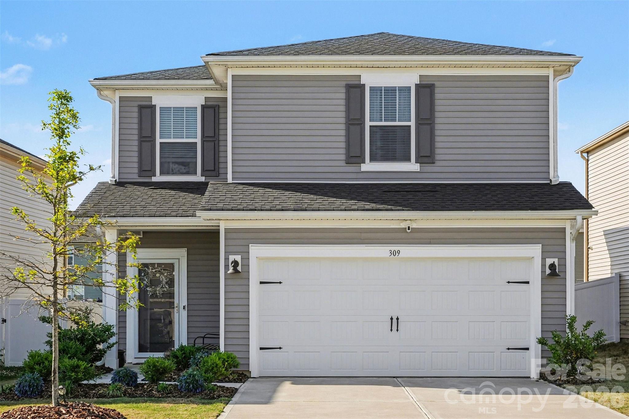 Why wait for new construction??? Don't miss out on this 2024 build 3 BR, 2.5 BA home with an attached 2 car garage, LVP floors throughout the first floor, open concept with lvingroom open to the kitchen with stainless steel appliances, center island with barstool seating and new pendant lighting. Sliders open to large, back yard backing to natural area. All 3 bedrooms are upstairs including the primary with private bathroom with dual sink and vanities. Upstairs laundry room.