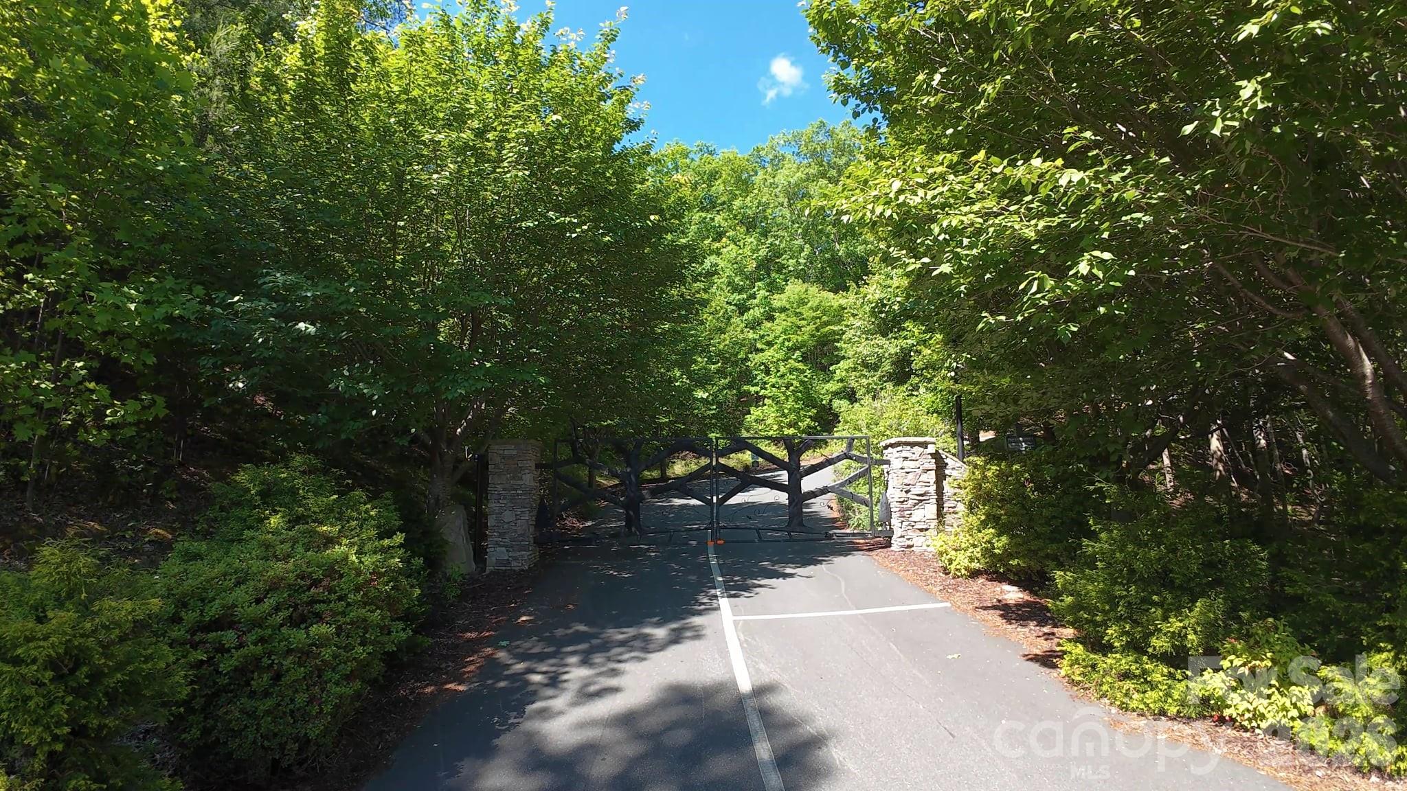 Discover the beauty of mountain living with Lot 85 in The Summit — a 3.42-acre homesite tucked inside one of Western North Carolina’s premier gated mountain communities. This property offers stunning long-range mountain views, peaceful surroundings, and the perfect setting to build your dream retreat, full-time residence, or vacation getaway.

Enjoy paved roads, underground utilities, and the privacy of a well-maintained mountain community surrounded by nature. Located in scenic Golden Valley, just a short drive to Bostic, Forest City, and local attractions, while conveniently positioned about halfway between Charlotte and Asheville.

With a minimum 1,200 SF build requirement and no manufactured homes allowed, this is an excellent opportunity to create a custom mountain escape in the NC foothills. Well and septic needed.
