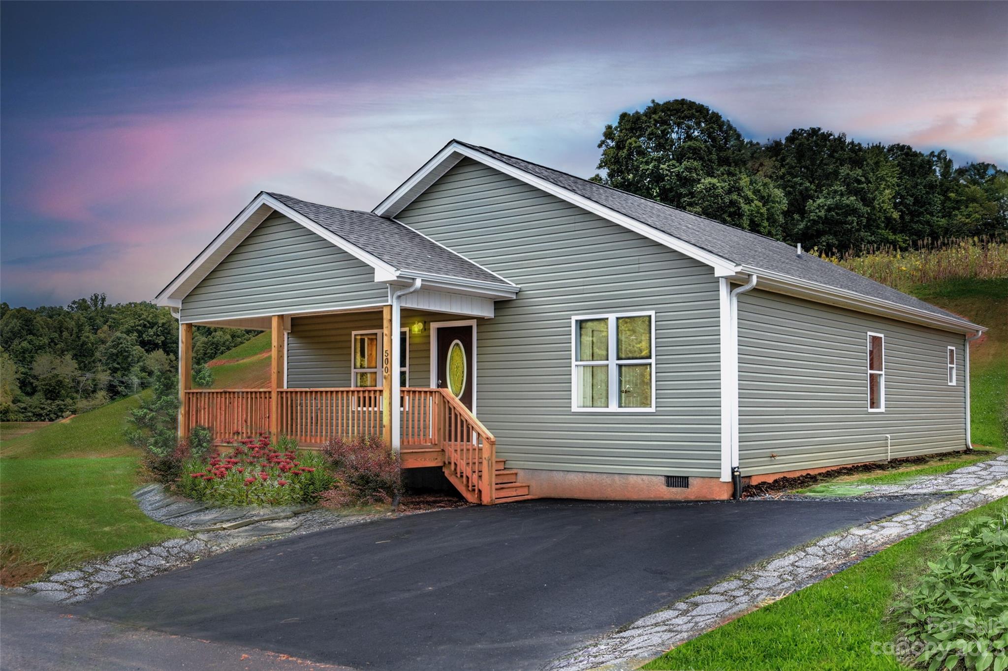 Escape the traffic come be a part of small town life just 20 minutes to downtown Asheville. New construction in  conveniently located new home community in Mars Hill. This site built home offers open floor plan, luxury waterproof vinyl plank flooring throughout, granite counter tops, stainless appliances, 2x6 exterior walls, and a front porch perfect for rocking chairs.  The community offers paved roads, high speed fiber optic internet, green space and all city services, including water/sewer, free trash pickup and free curbside recycling. Close to schools, restaurants and shopping. Homes are USDA and VA approved.  Taxes to be determined. Photos are representative