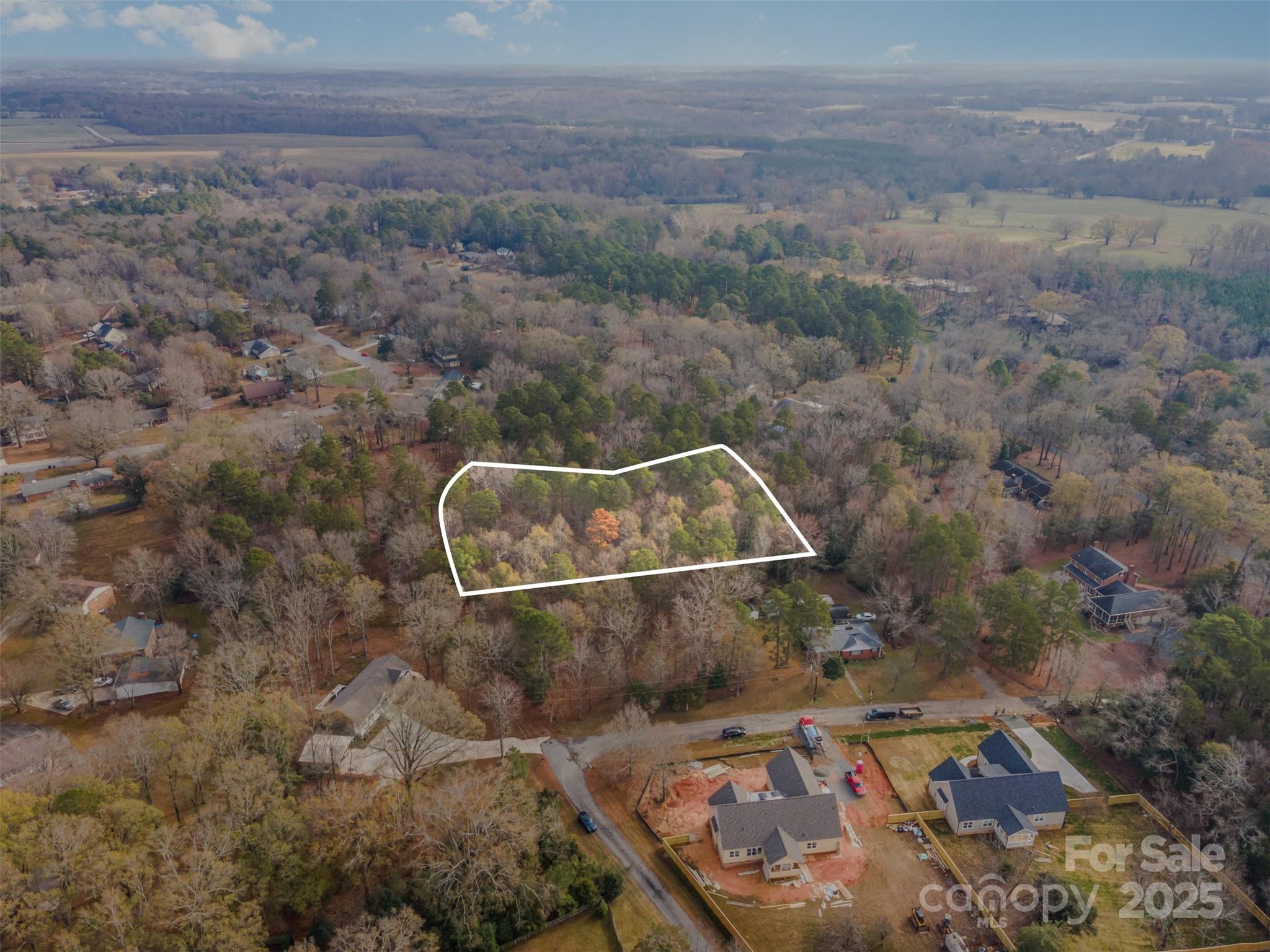 Beautiful wooded tract with a full acre of land that can be subdivided. Whether you want ample space to design a custom home that fits your lifestyle or build 2 homes. Do you dream of a cozy cabin, a modern farmhouse, or a spacious ranch-style home, this lot gives you the freedom to build exactly what you want. Close to everything that downtown Monroe has to offer!

**Please note that current zoning allows for 2 houses per acre**