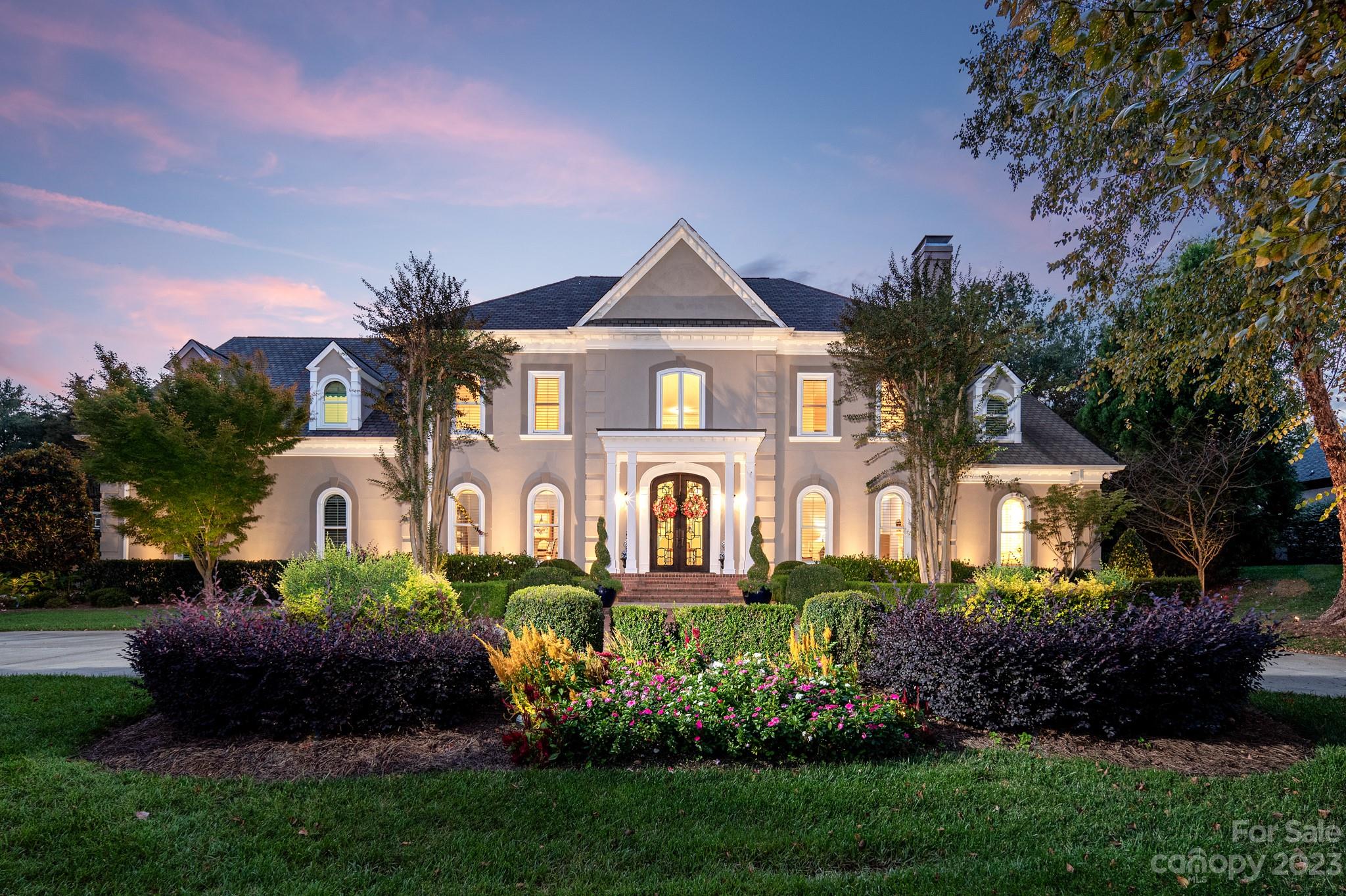 Absolutely stunning estate home in coveted Seven Eagles, home to the most exclusive community on the Quail Hollow Course! Amazing attention to detail throughout this bright, open & airy floorplan! Gleaming hardwoods, extensive moldings, high ceilings & beautiful updates throughout! Main level boasts chef kitchen open to breakfast area w/ large light filled sunroom. Great room has collapsible doors open to covered patio complete w/ built in grill & spectacular pool! Each of the 5 bdrms have ensuite baths & upstairs office has a closet that could easily be used as a 6th bdrm w/ its own full bath. No need for a 6th bdrm? This room serves as a beautiful office or exercise room. Large movie/bonus room upstairs currently shown as movie room but screen raises to a wall full of windows. Large lot w/plenty of grass to play, extensive landscaping & gorgeous hardscape! Meticulously maintained, home generator & spray foam insulation.  Completely immaculate and 100% move in ready! Welcome home!
