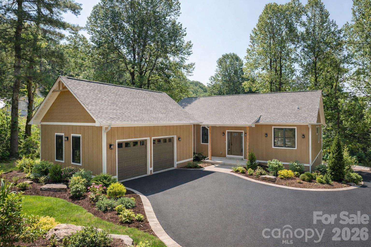 NEW CONSTRUCTION, Located in Kenmure this brand new cottage - home has an outstanding open floor plan and easy ingress and egress, nearly flat lot and beautiful natural setting at nearly 3,000 feet of elevation. This home is complete and driveway recently paved. Easy to show and call listing agents for appointment.

Buyer to receive 50% off Kenmure club initiation fee.