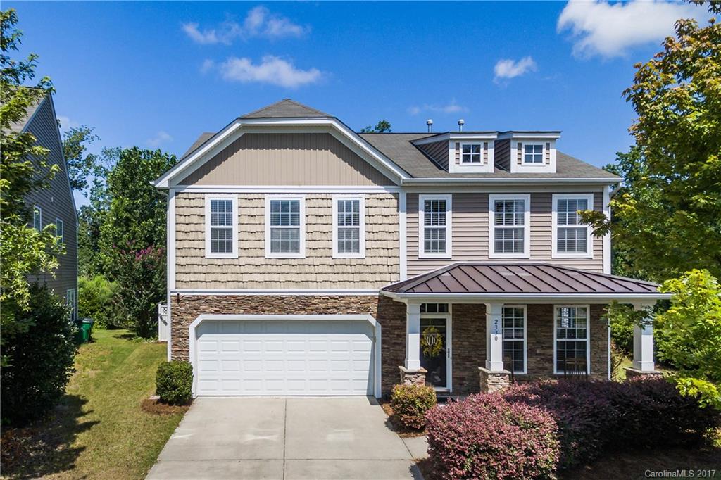 Nestled on a private corner lot in desirable Cedar Mill. Level lot bordering woods w/ large fenced backyard. Spacious 4 bedrooms including over-sized master suite w/ tray ceiling. Perfect open concept between kitchen, living room dining area and wonderful Archadeck-built covered porch for entertaining. Community pool, clubhouse & playground. Enjoy new carpets throughout this move-in ready home. Great location, easy access to downtown CLT, CLT airport and National Whitewater Center.