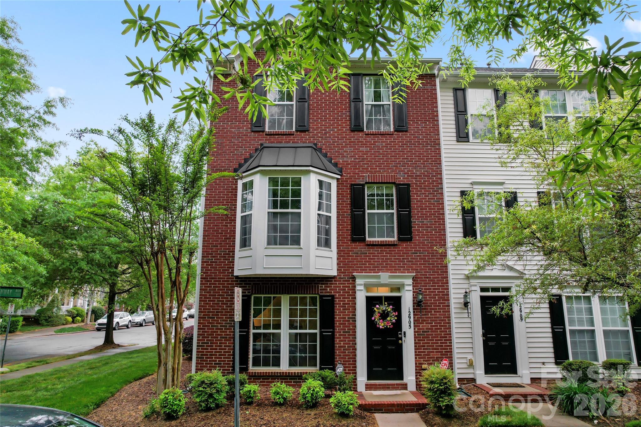 Don't miss this stunning corner lot property right across the greenspace with nature trails!!! This 3 story town home offers, a large deck in the back perfect for entertaining, 3 bedrooms and 2 full baths and 2 half baths and two full kitchens. Kitchen on the second floor has freshly painted cabinets.  Lowest floor features a private, fully equipped multi-generational living space with its own private entrance, full kitchen and separate living area, ideal for guests.  This space is currently tenant-occupied, offerings buyers the excellent option to keep the existing tenants and renew the current lease agreement.  A unique and versatile property in desirable location!!!    seller is related to listing agent.