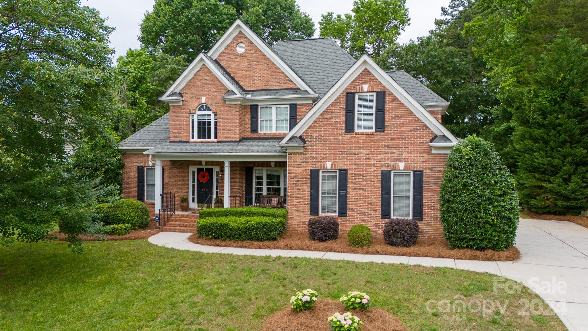 POOL!  HOT TUB! ALL BRICK! 2 new 2023 Bosch hybrid HVAC systems w/ app control, 2023 garage doors +opener w/ app! 5 br 3 full brick home w/ back yard oasis-ready for your summer fun!  Gunnite in ground pool w/ hot tub, river stone accents, huge grilling deck, firepit,horseshoe pit all within fenced tree lined back yard! Primary bedroom ensuite on main and dbl vanities, soaker tub, walk in shower,french doors to back deck.  Guest suite on main (or office) overlooks the back yard.   Open floor plan for entertaining includes granite countertops in the kitchen w/ stainless appliances,double oven stove, wine cooler.  Breakfast bar, dining room and breakfast room all surround  large great room w/ fireplace and vaulted ceilings.  Upstairs has 3 more bedrooms and 1 jack and jill bath w/ separate vanities.  All bedrooms up have walk in closets.  Home has plenty of storage....walk in attic, 2 pull down attics, storage nooks, stand up under house storage and under deck storage!    Move in ready!